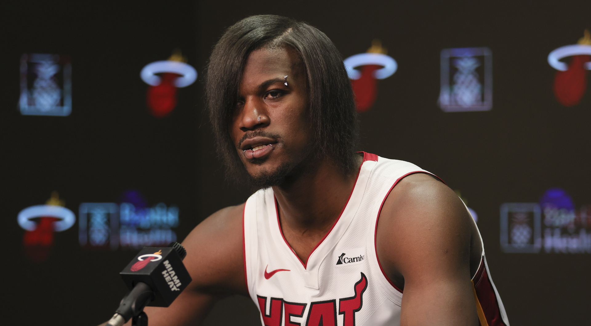 Jimmy Butler Rocks Emo Look With Straightened Hair and Piercings