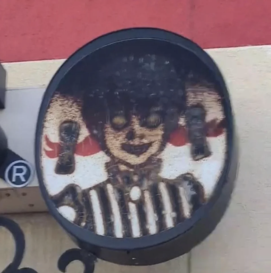 A burnt Wendy's sign