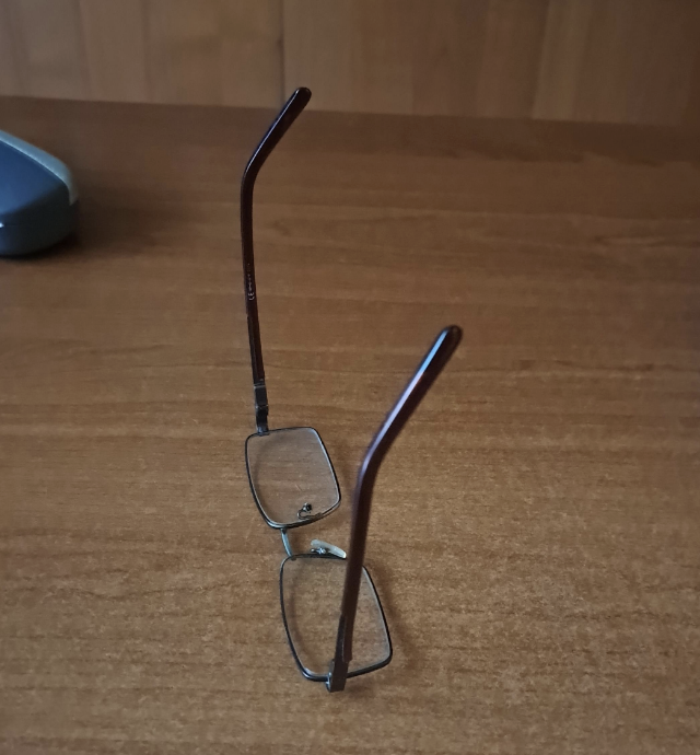 Glasses placed with the lenses touching the table