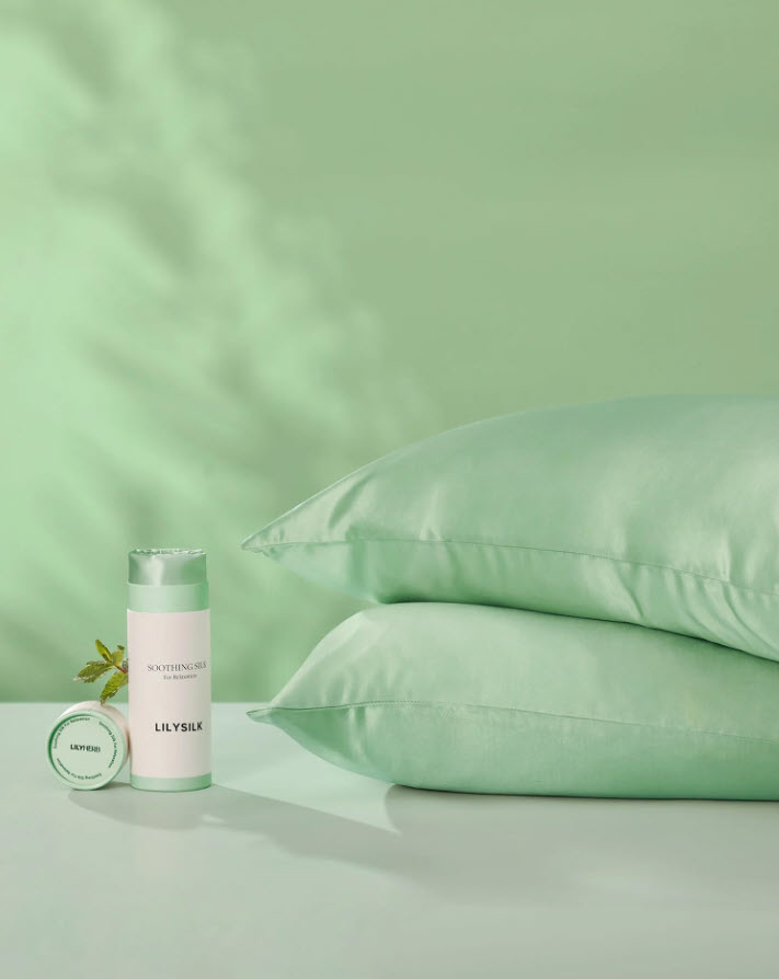 set of two mint green silk pillowcases