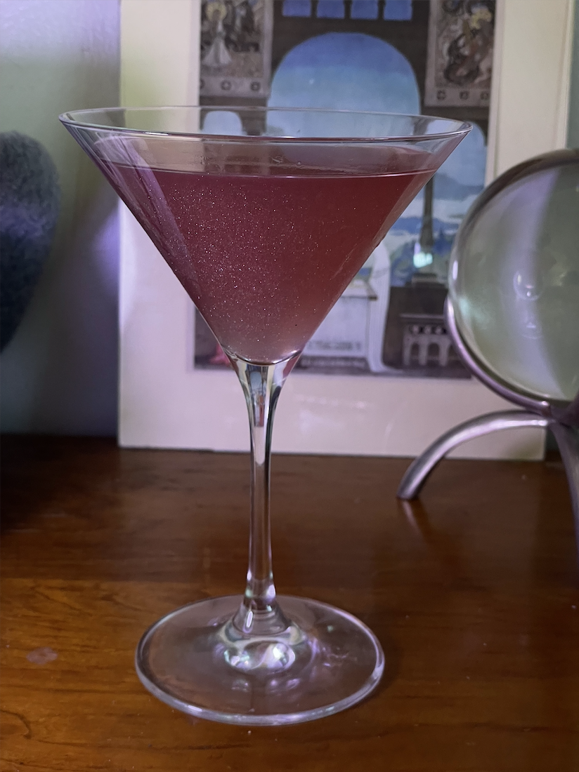 the cocktail in a martini glass
