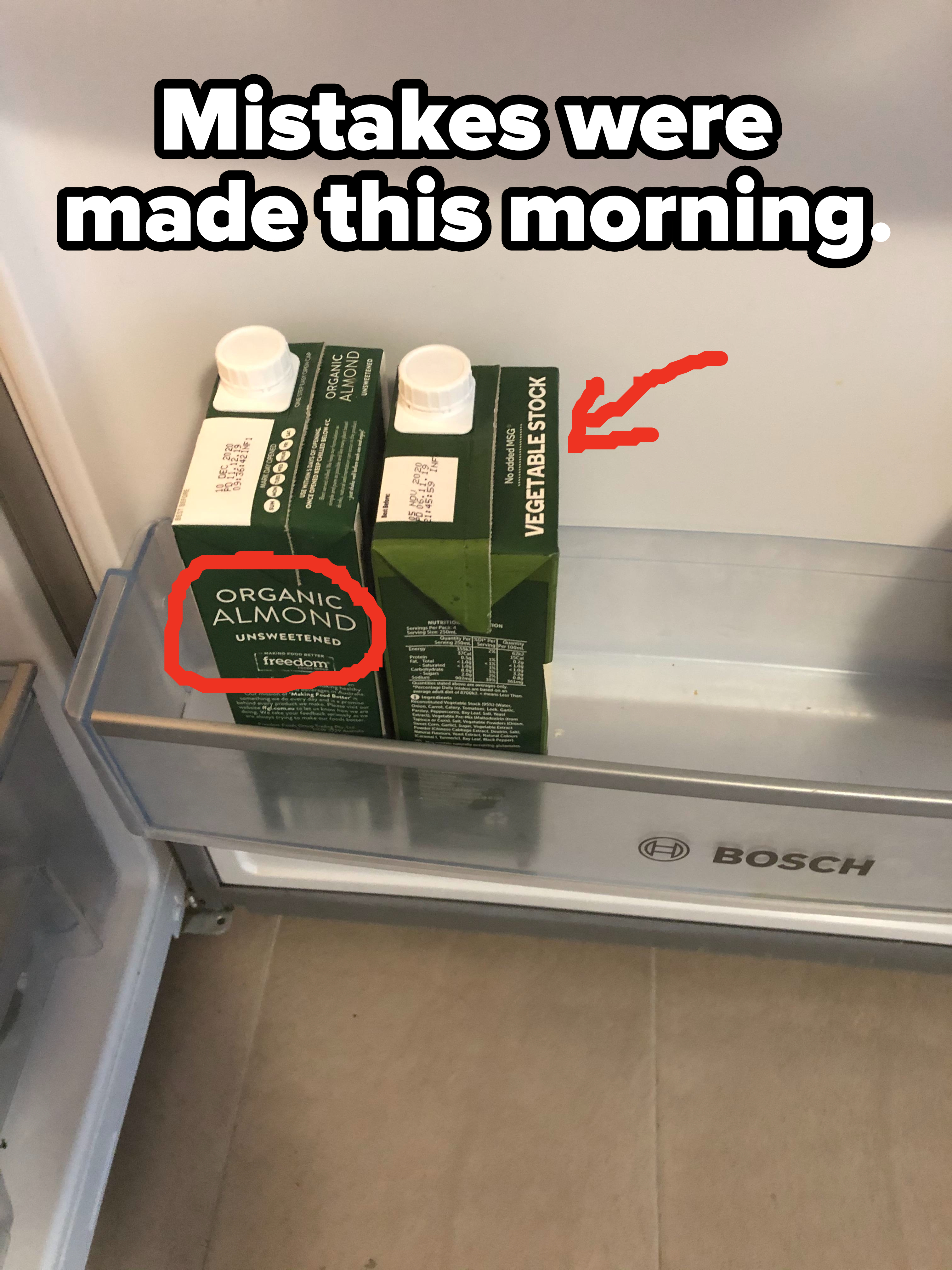 &quot;Mistakes were made this morning&quot; caption with view of two identical-looking containers in the fridge, one of organic almond milk and another of vegetable stock