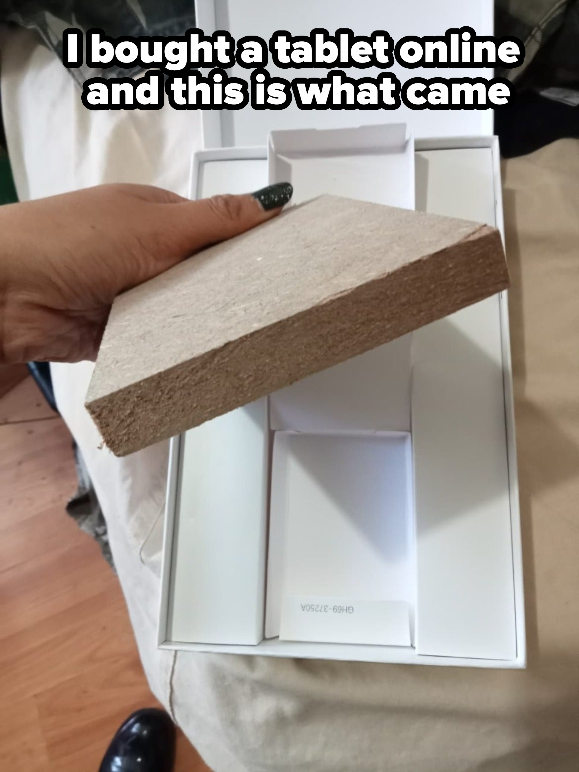 A box with a piece of stone instead of a tablet