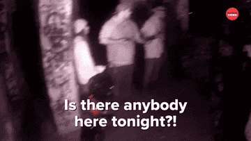 Ghost hunters in night vision camera say "Is there anybody here tonight?!"