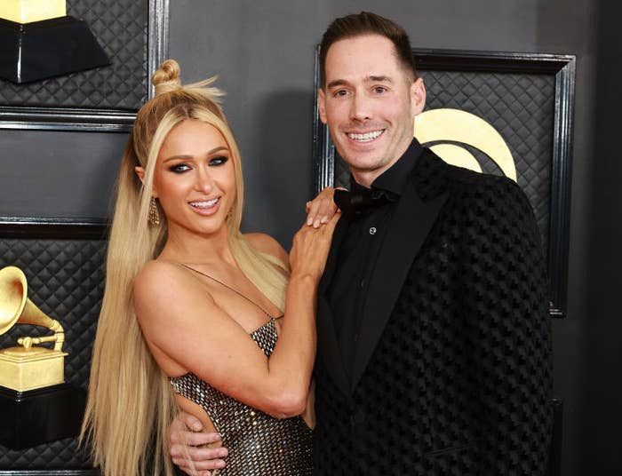 Closeup of Paris Hilton and Carter Reum smiling on the Grammy&#x27;s red carpet