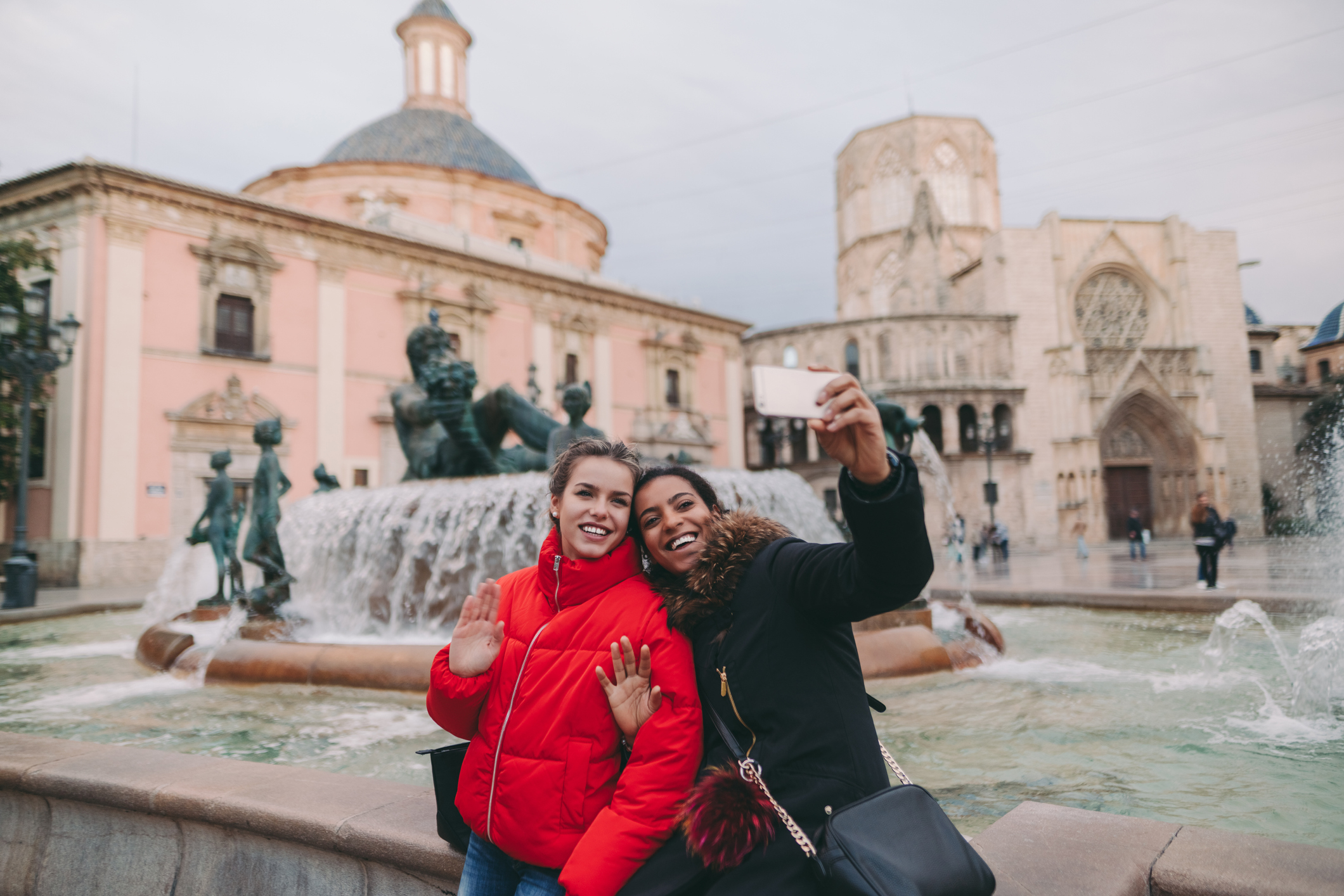 Two women are taking a selfie while on vacation