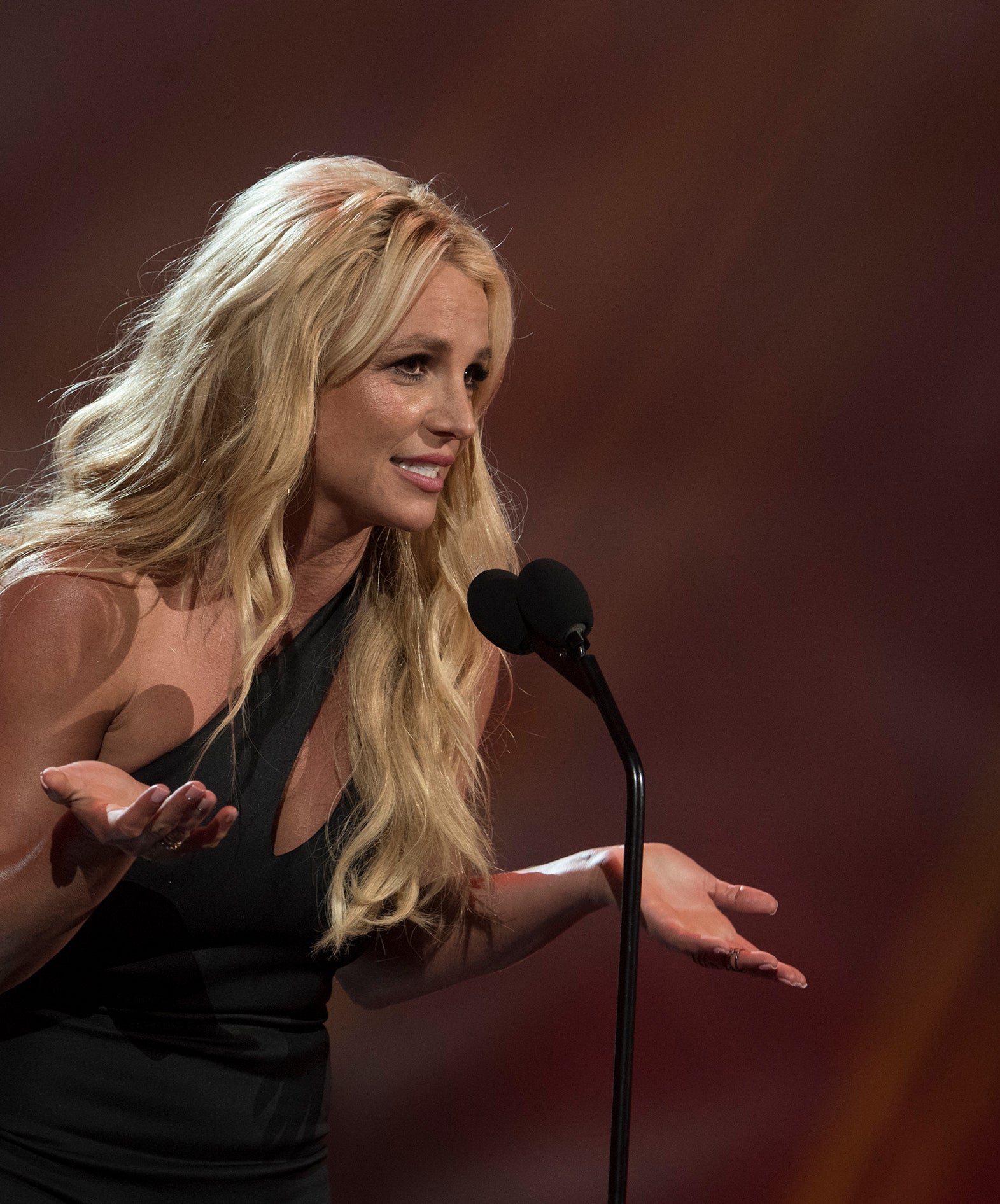 britney on stage speaking in to a mic