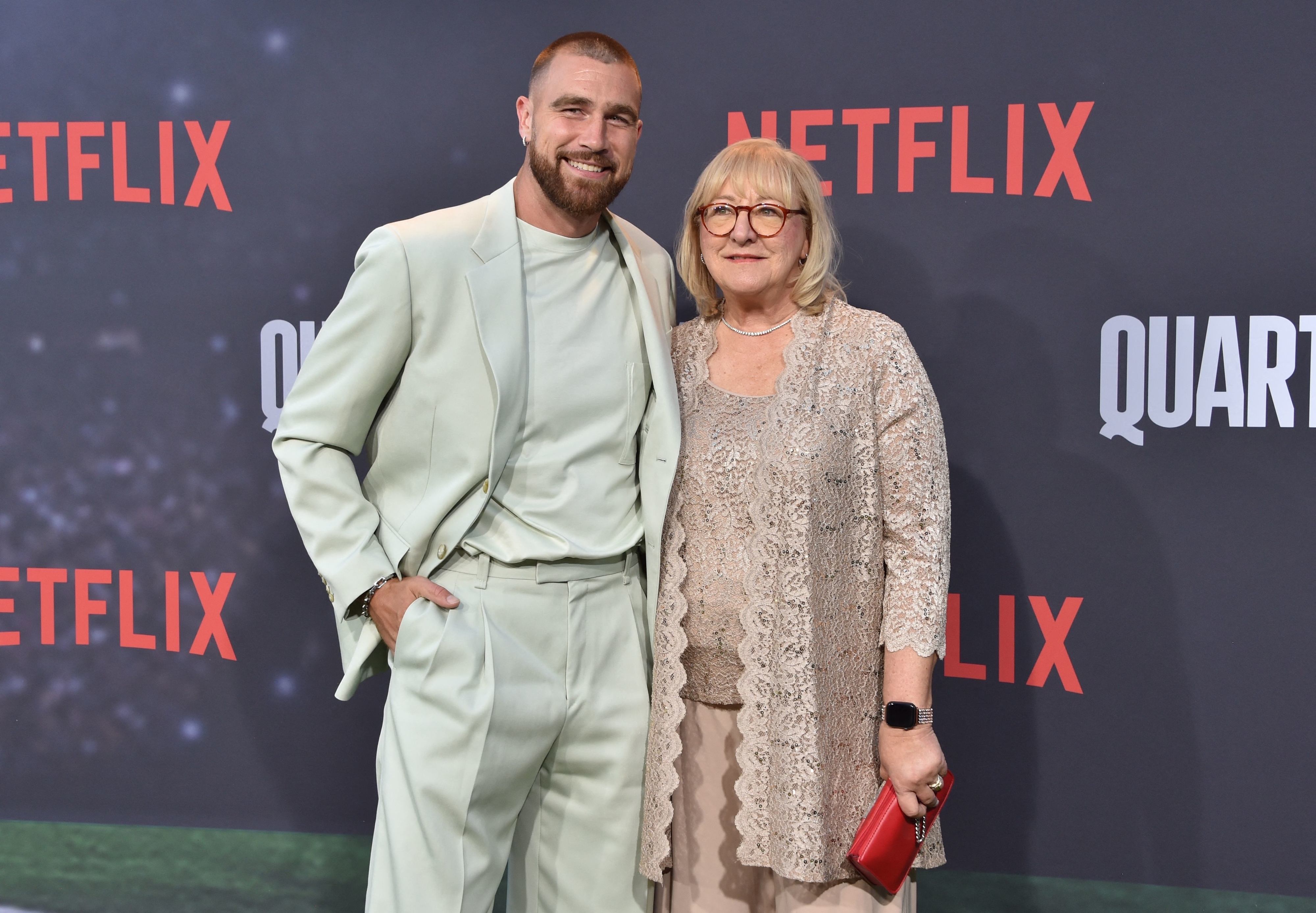 closeup of travis and his mom at a netflix event