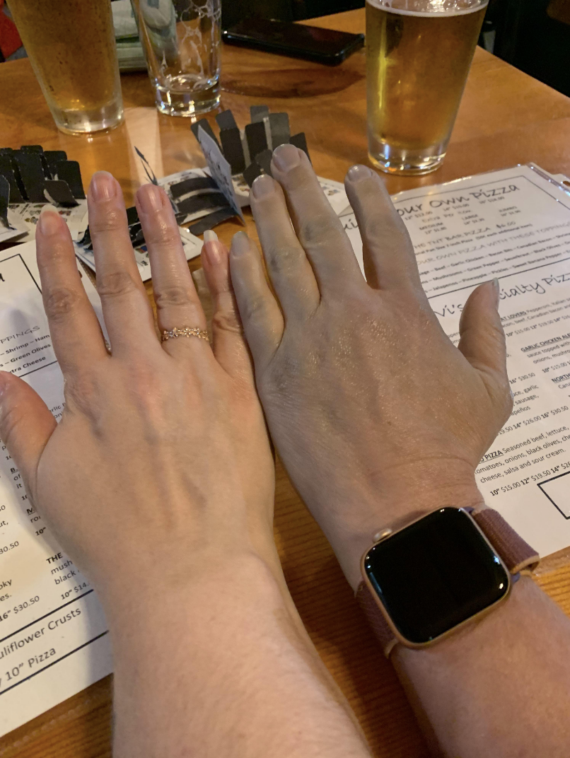 two hands next to each other
