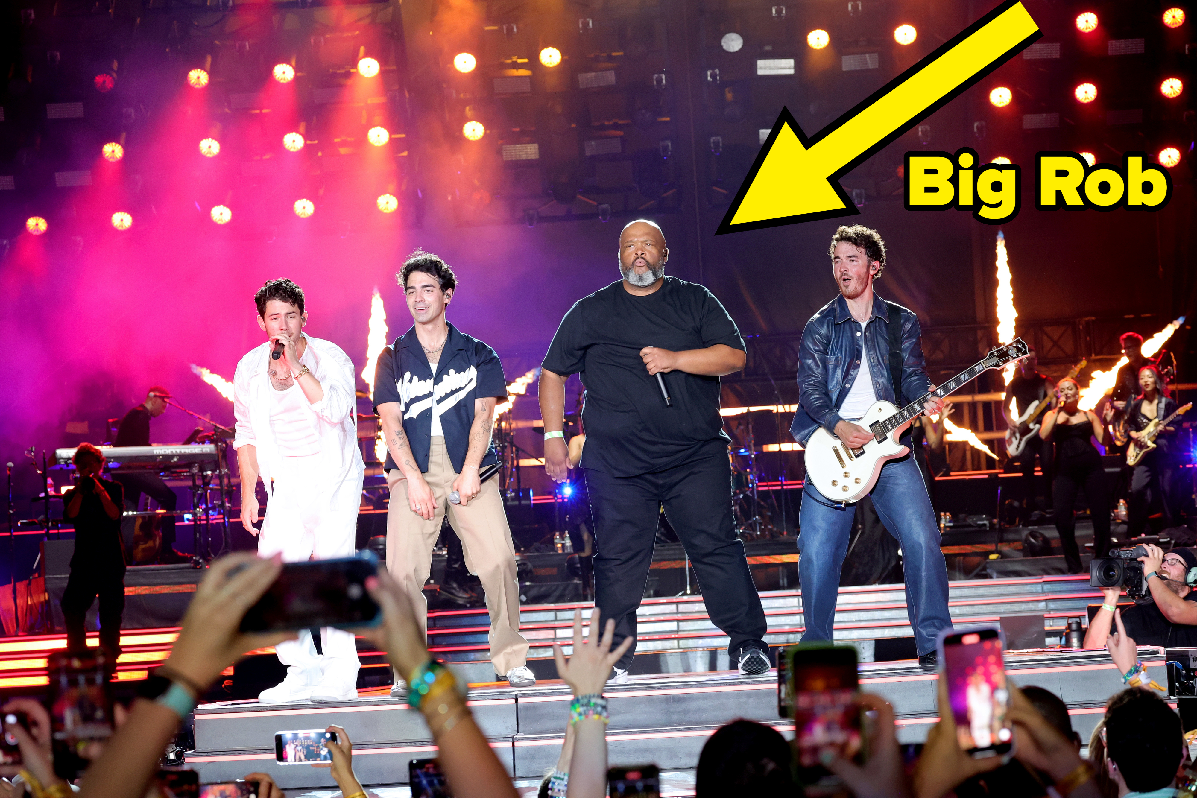 Big Rob onstage with The Jonas Brothers