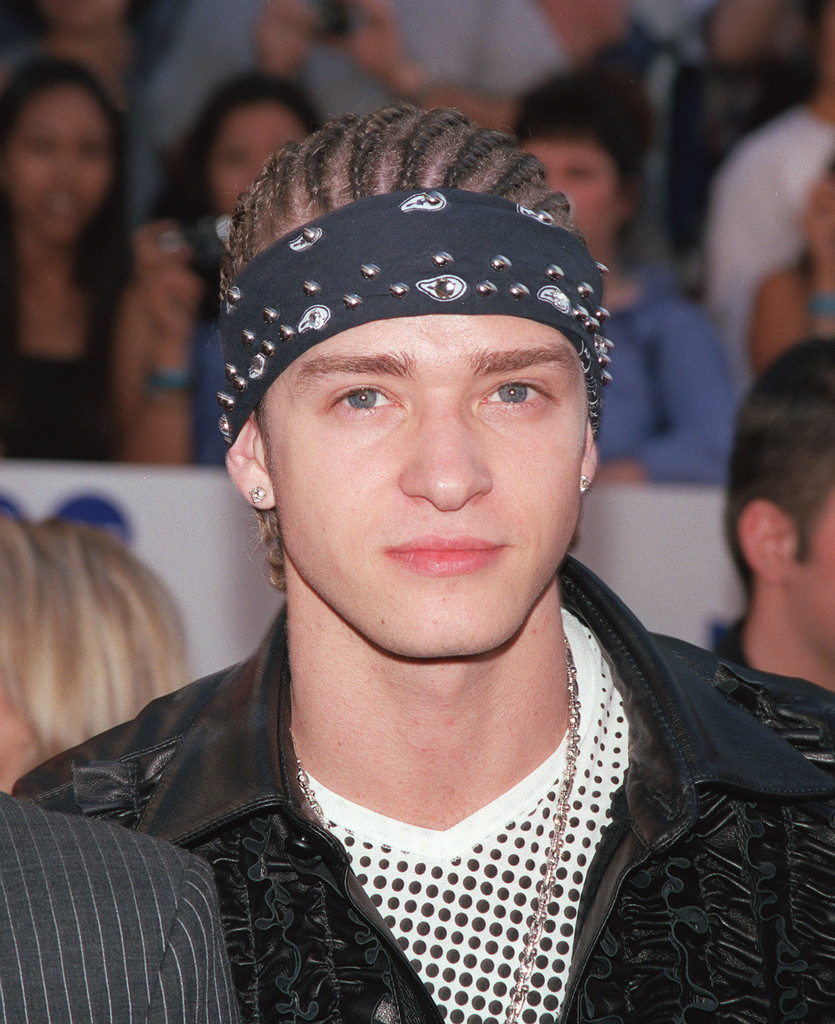 Justin Timberlake at a media event in cornrows and a bandanna across his forehead