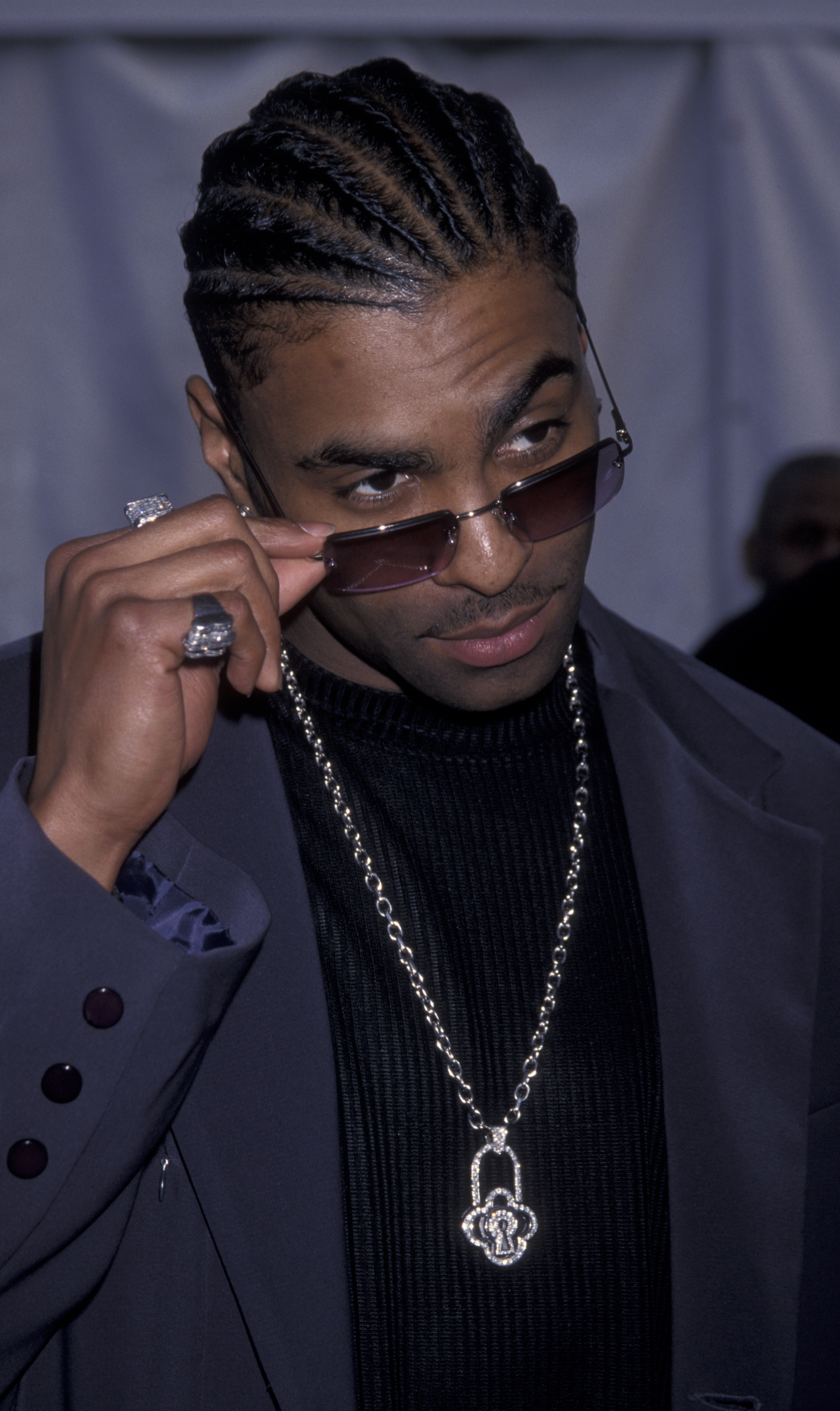 Ginuwine looking over his sunglasses