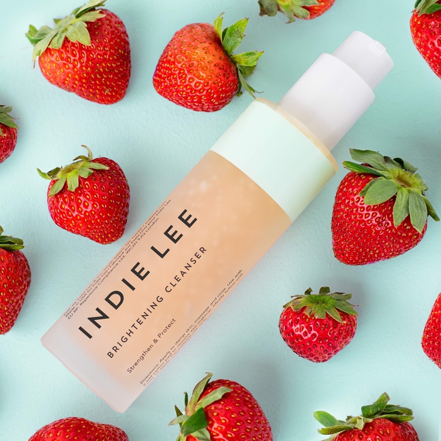 the cleanser surrounded by strawberries