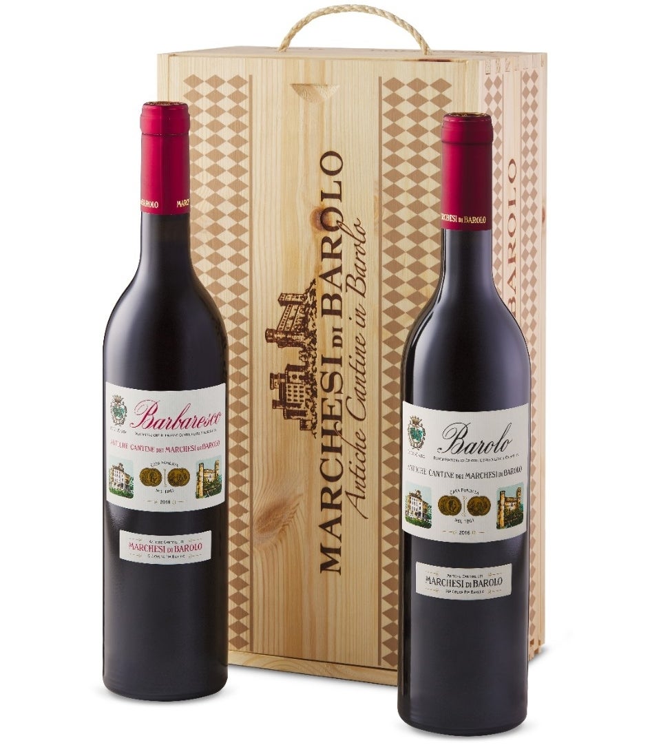 Two bottles of wine in front of their gift box