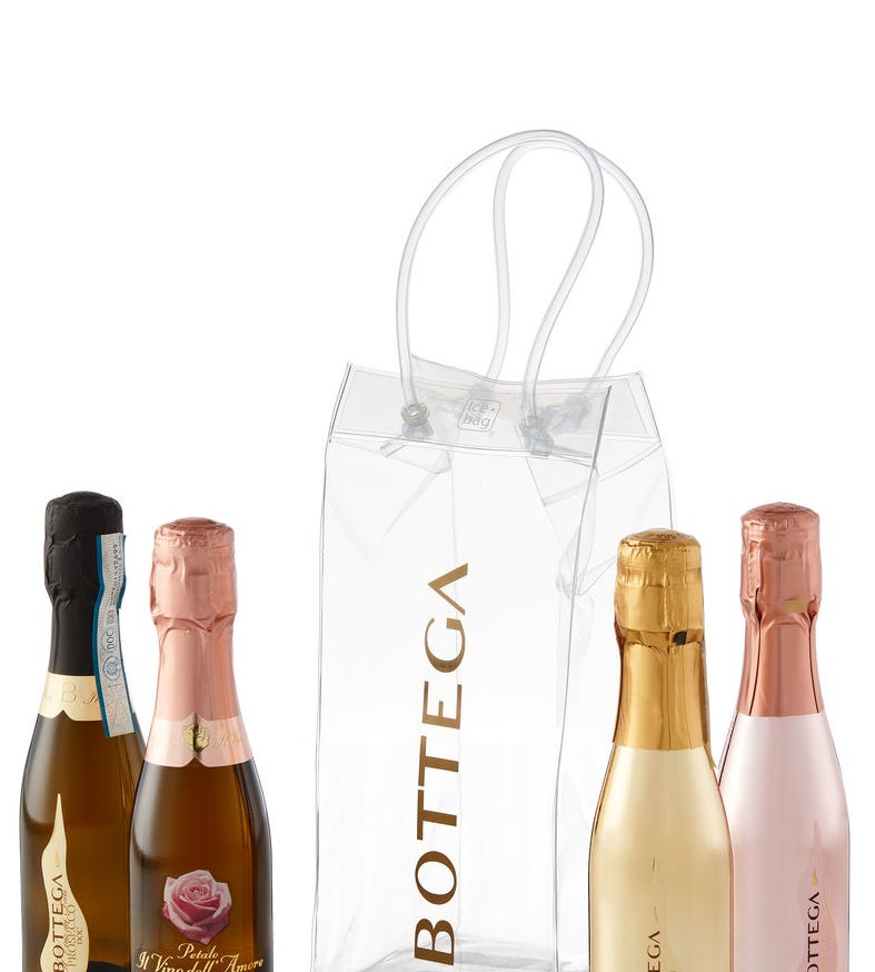 Four mini bottles of Bottega sparkling wine surrounding their gift bag