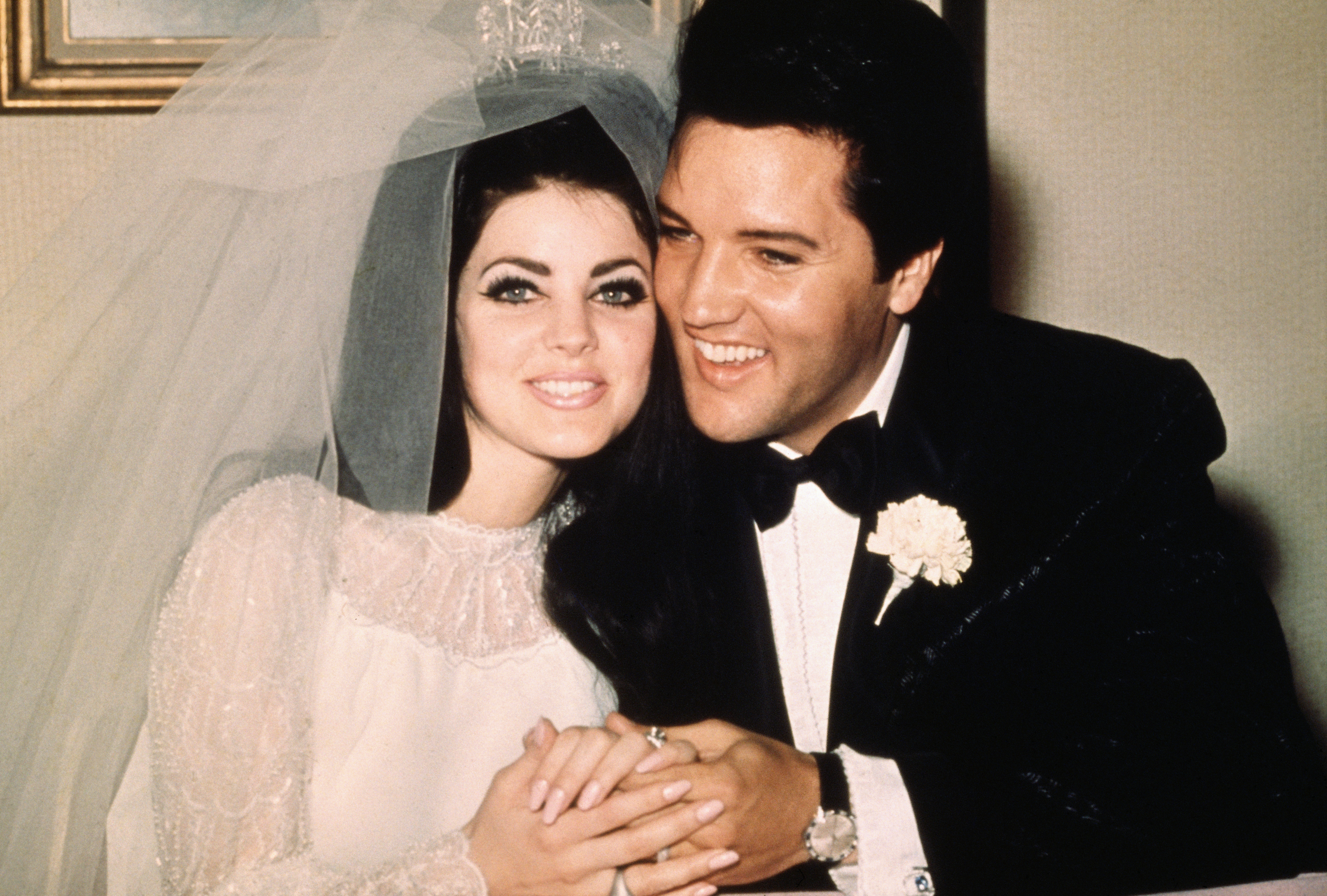 Closeup of Priscilla and Elvis Presley on their wedding day