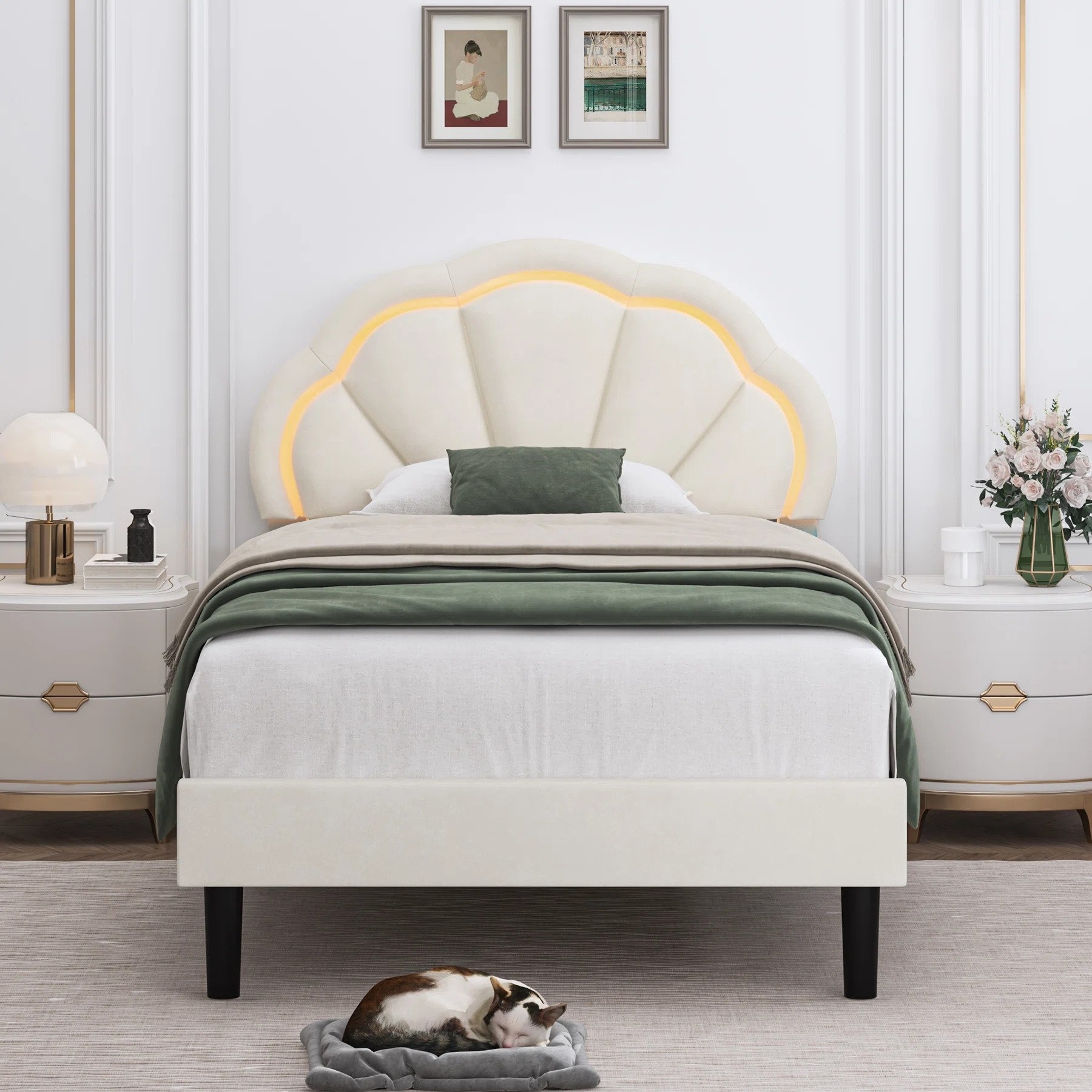 The bed in a cream color, featuring a headboard with a flower silhouette