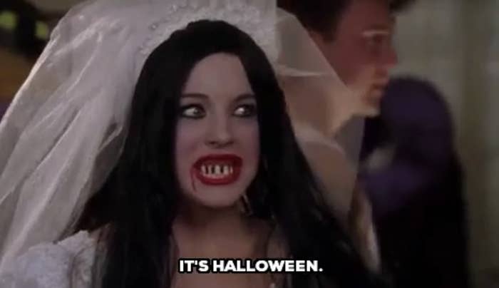 Mean girls scene with Cadie dressed up in a Halloween costume with caption &quot;It's Halloween&quot;