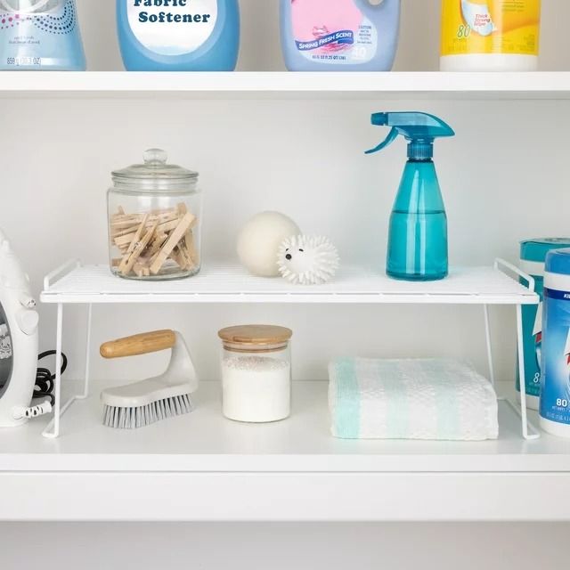 The stackable shelf in a cabinet