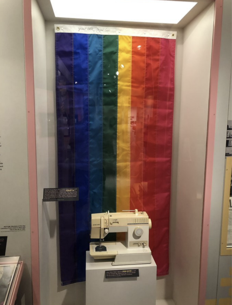 the long flag behind the sewing machine