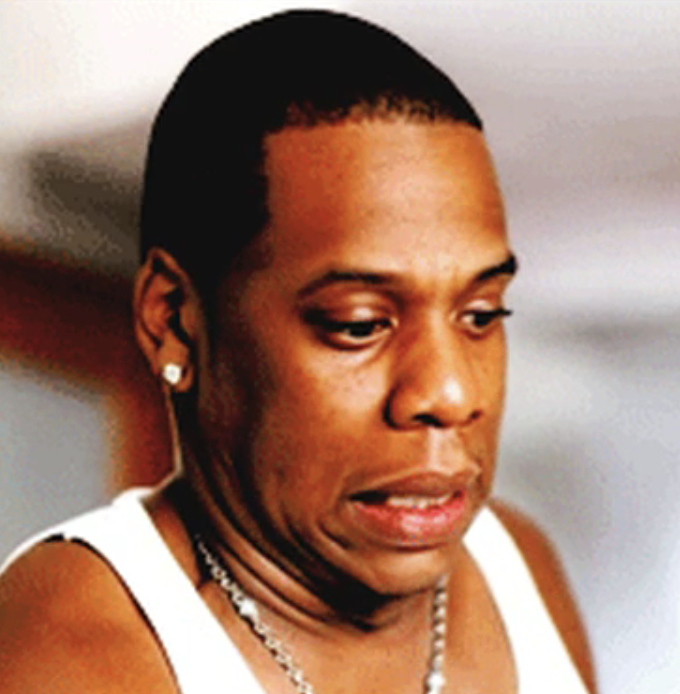 Jay-Z in his &quot;I Just Wanna Love U (Give It 2 Me)&quot; music video grimacing
