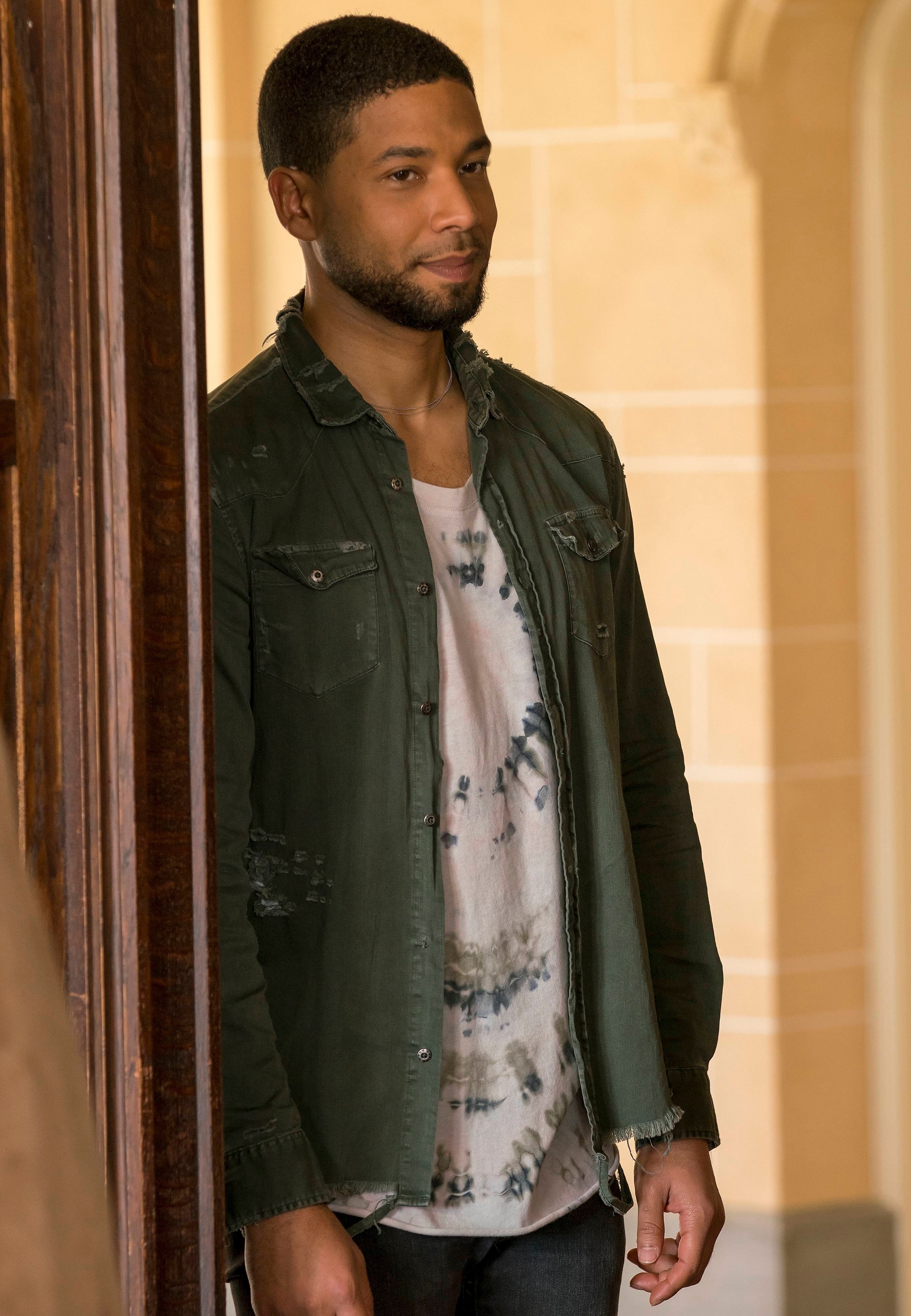 Close-up of Jussie standing in a doorway