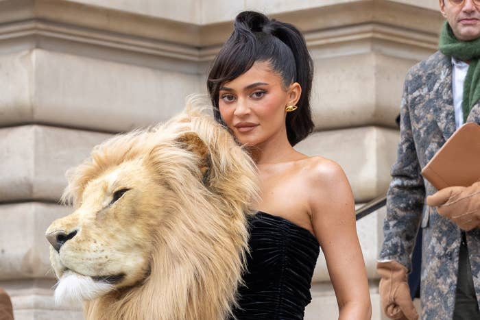 Closeup of Kylie Jenner wearing a Schiaparellli dress with a lion&#x27;s head