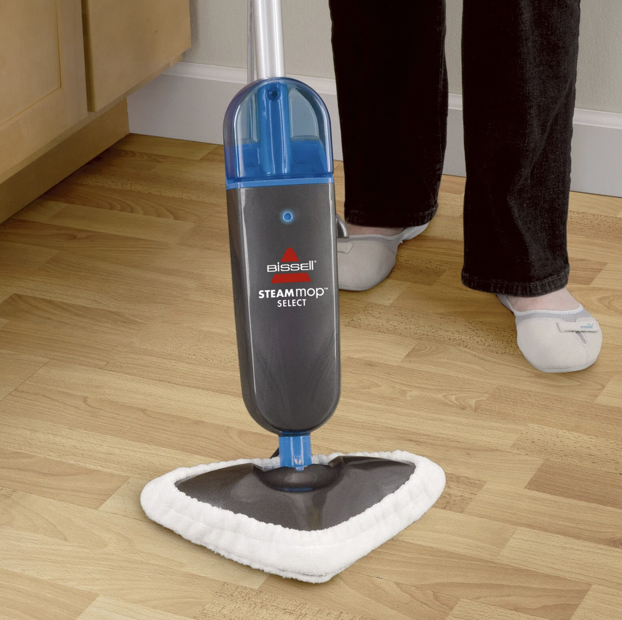 the steam mop on a wooden floor