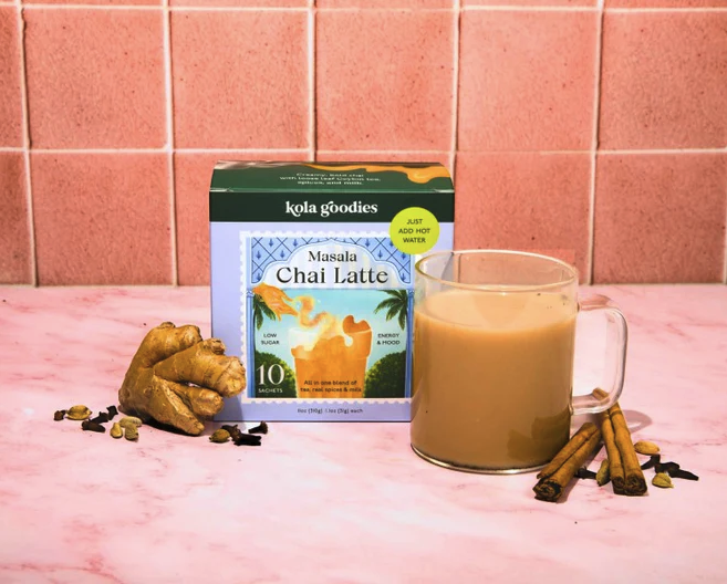 masala chai box with chai in mug and spices