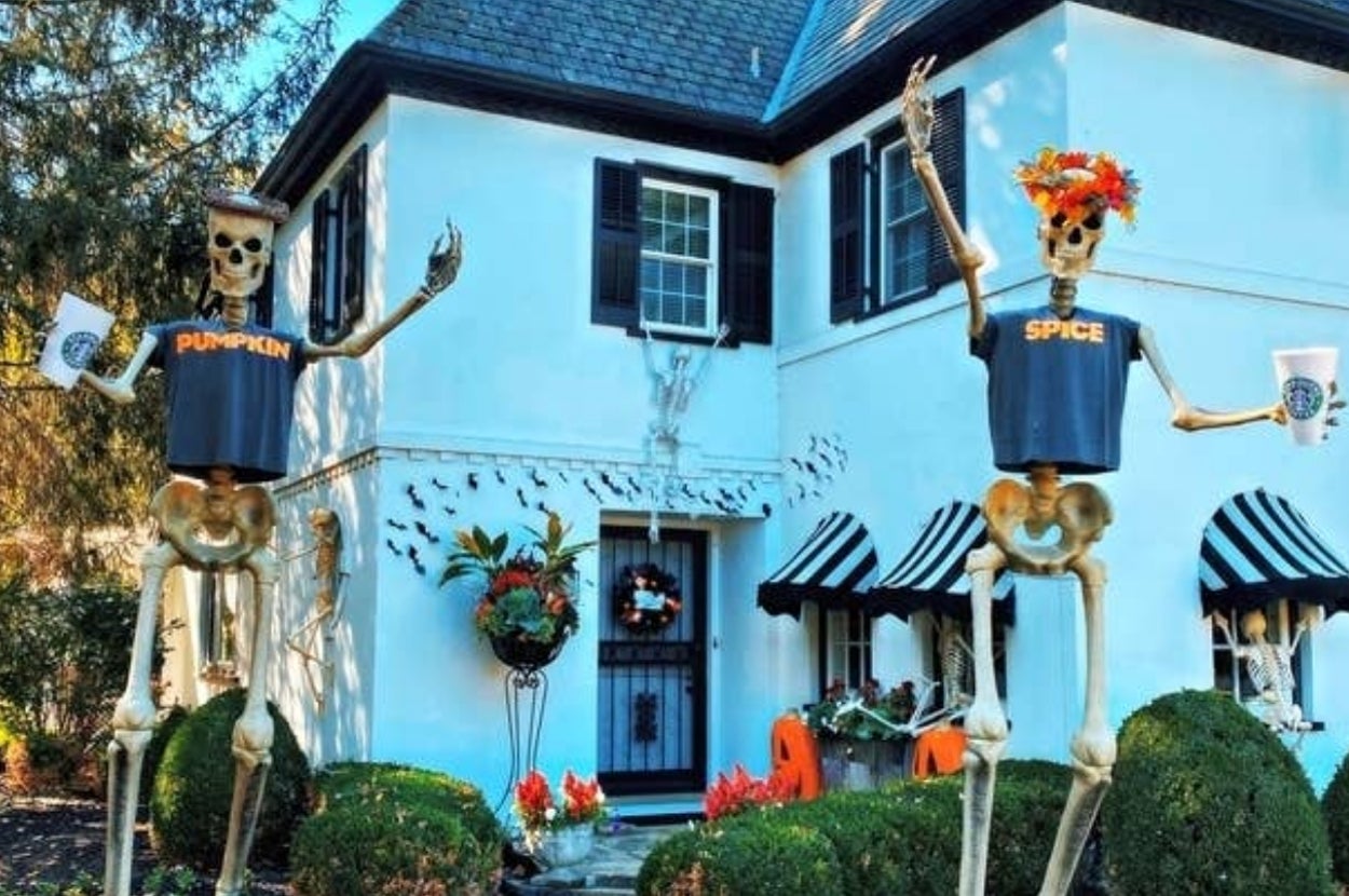 two skeleton with shirts that say "pumpkin" and "spice"