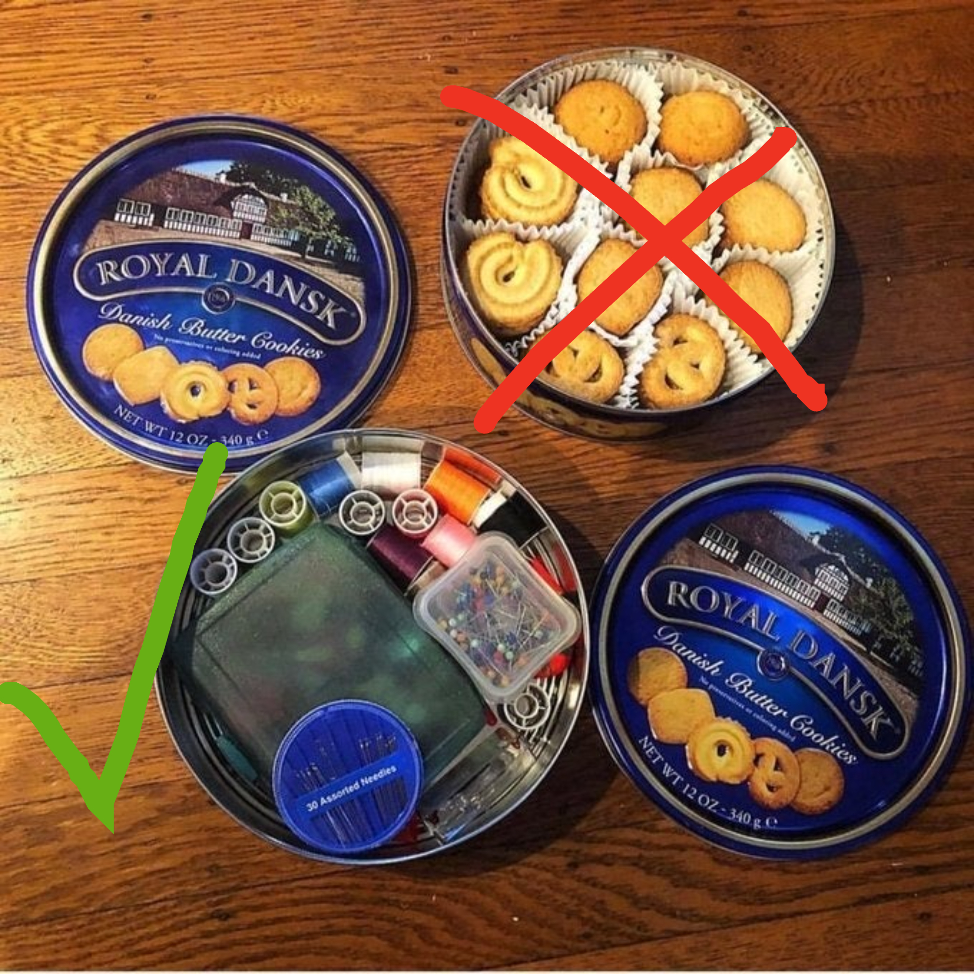 A cookie tin filled with cookies x&#x27;ed out, and one with sewing accessories
