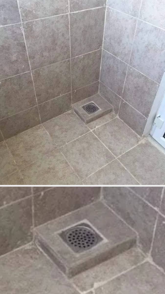 shower drain raised and put in a corner