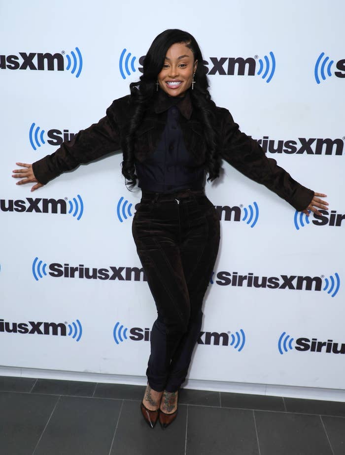 Angela smiling at a media event