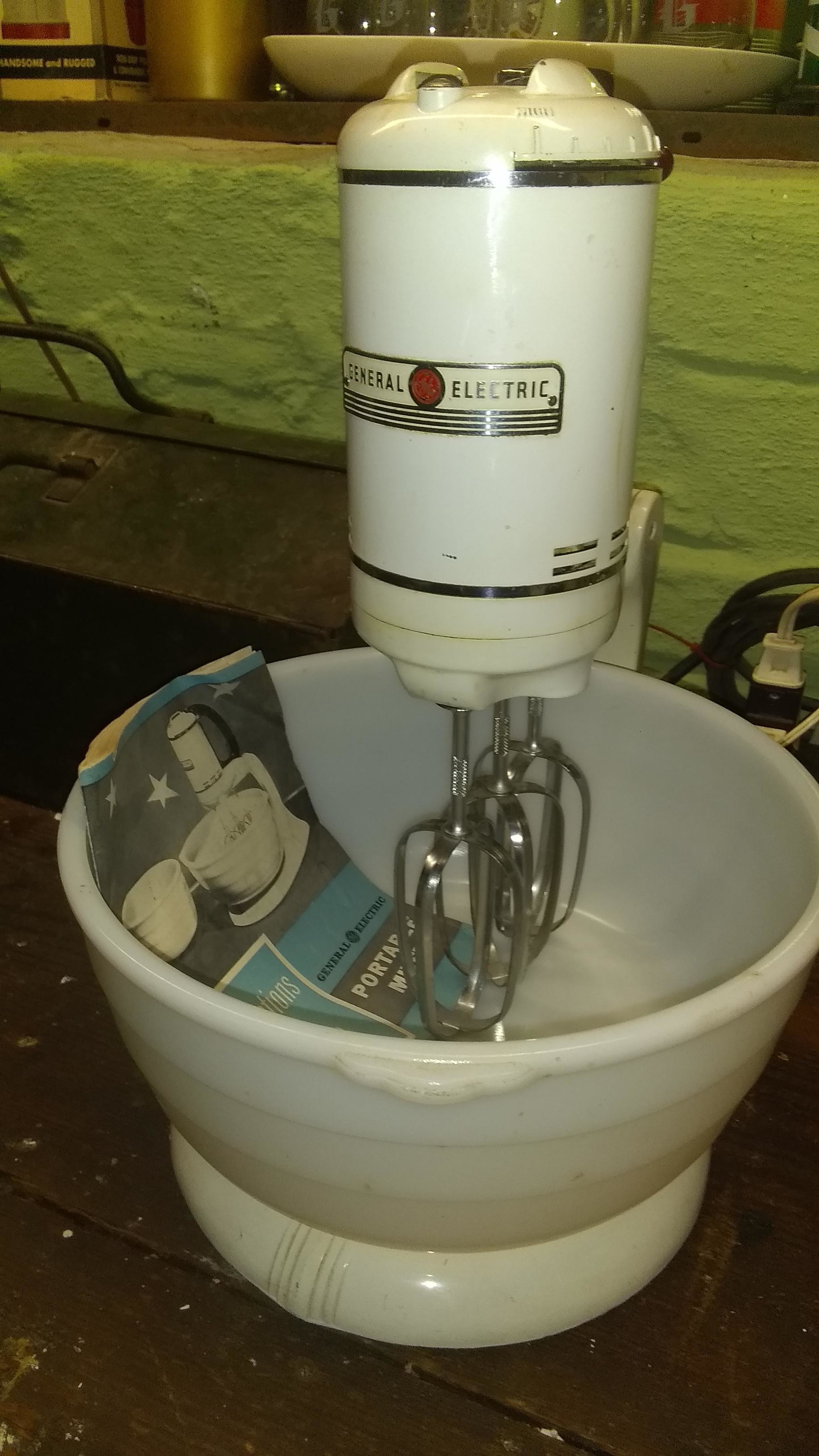 electric mixer with three beater attachments