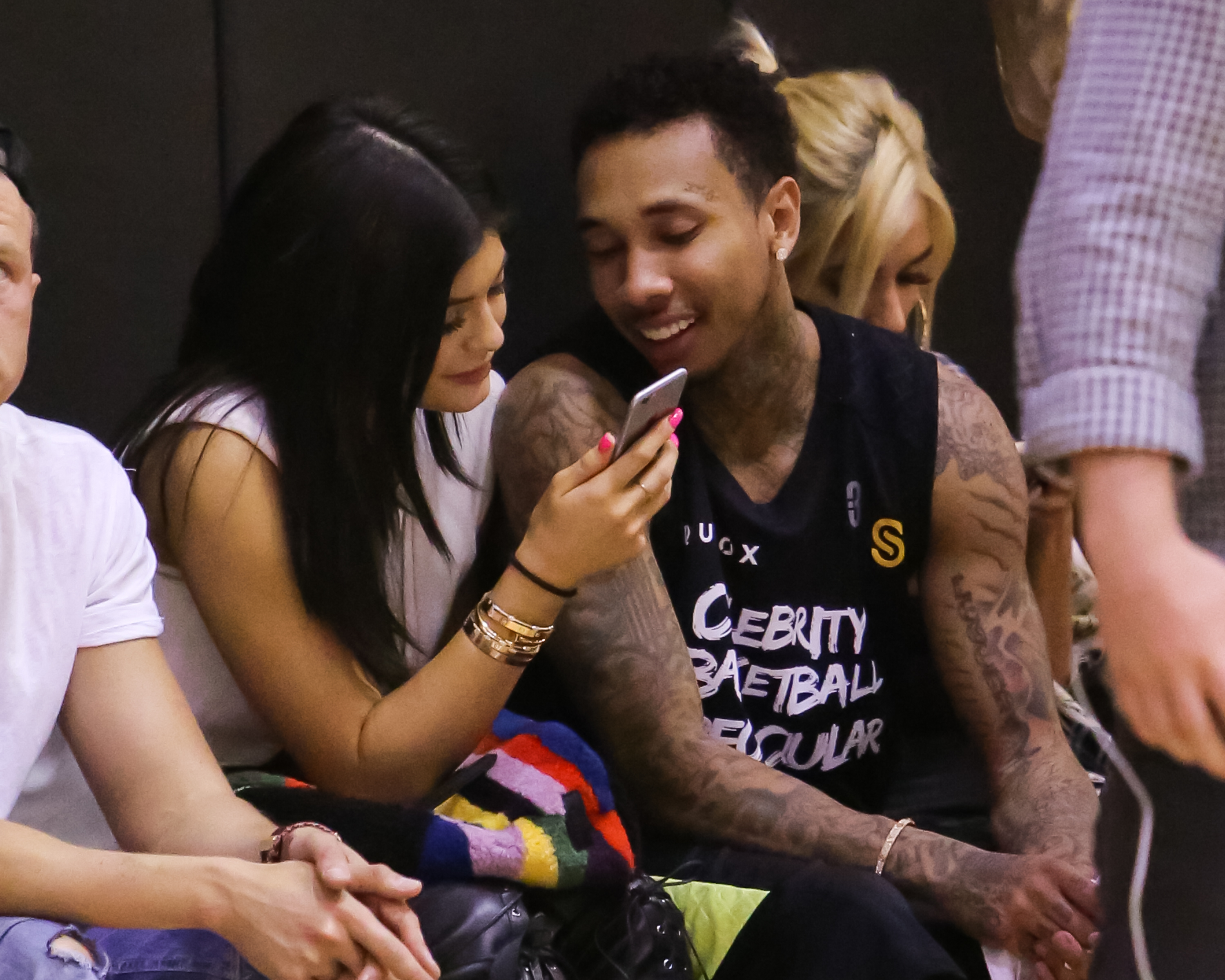 Close-up of Tyga and Kylie sitting together