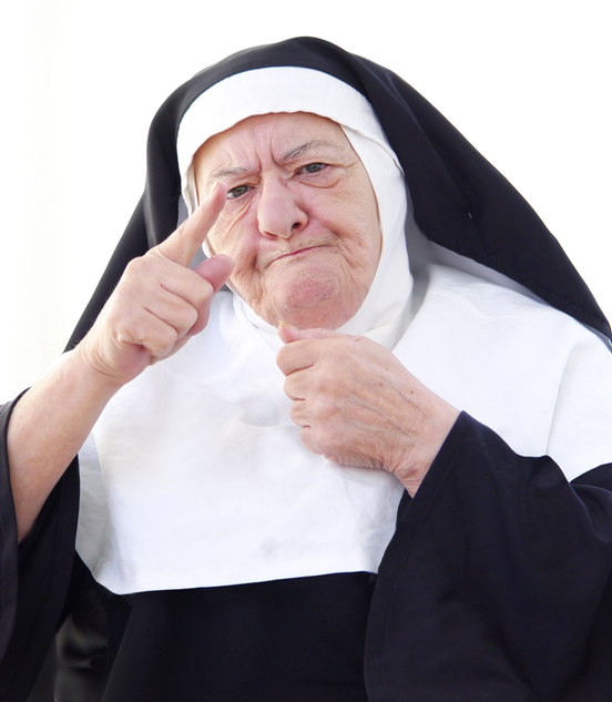 a nun pointing