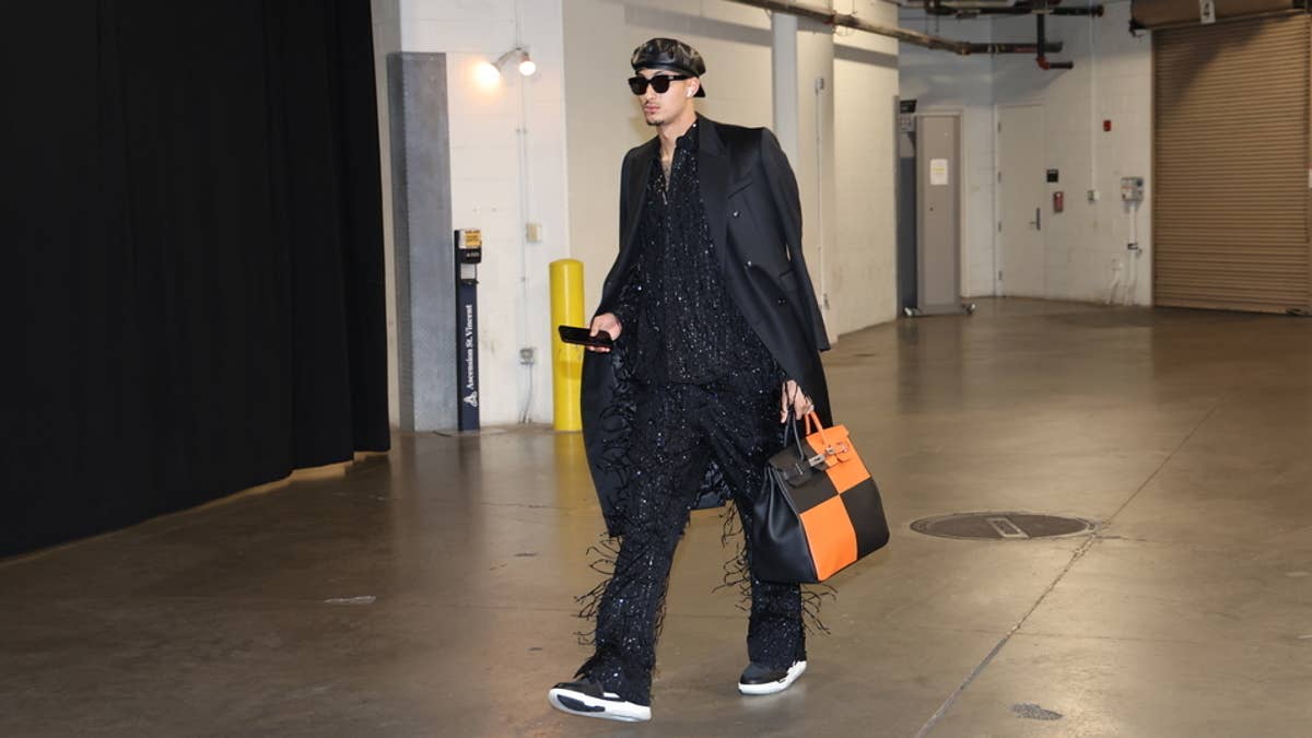 The Wizards star scored a team-high 25 points in his team's season opener after pulling up in an Amiri fit.