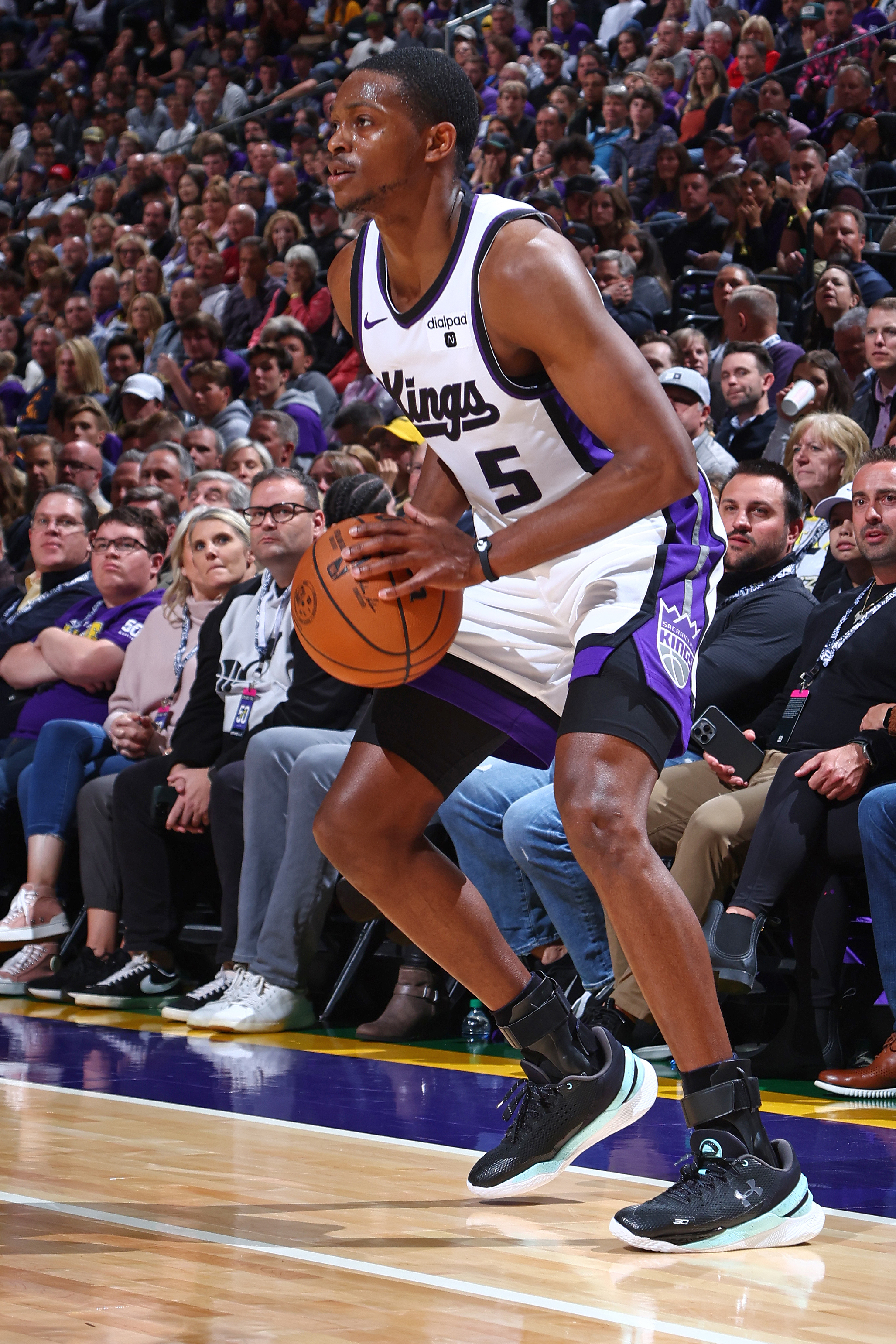 De&#x27;Aaron Fox #5 of the Sacramento Kings looks to shoot the ball during the game against the Utah Jazz on October 25, 2023 at Delta Center in Salt Lake City, Utah.