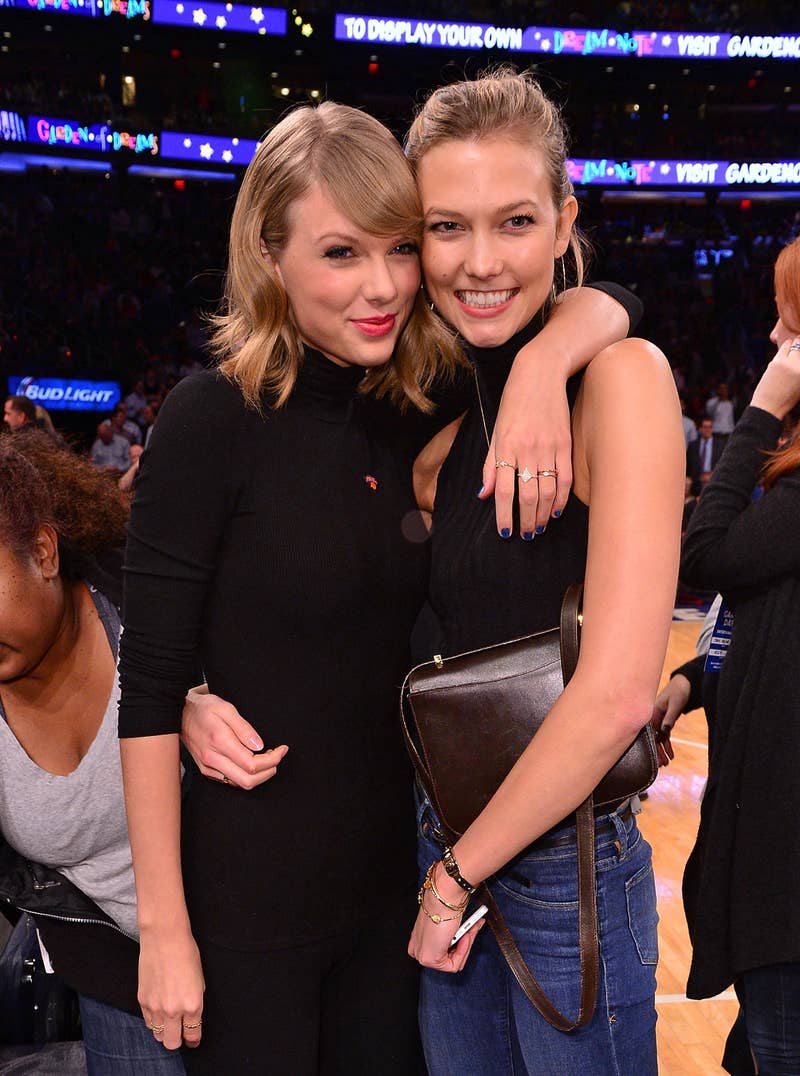 Close-up of Taylor and Karlie hugging at a basketball game