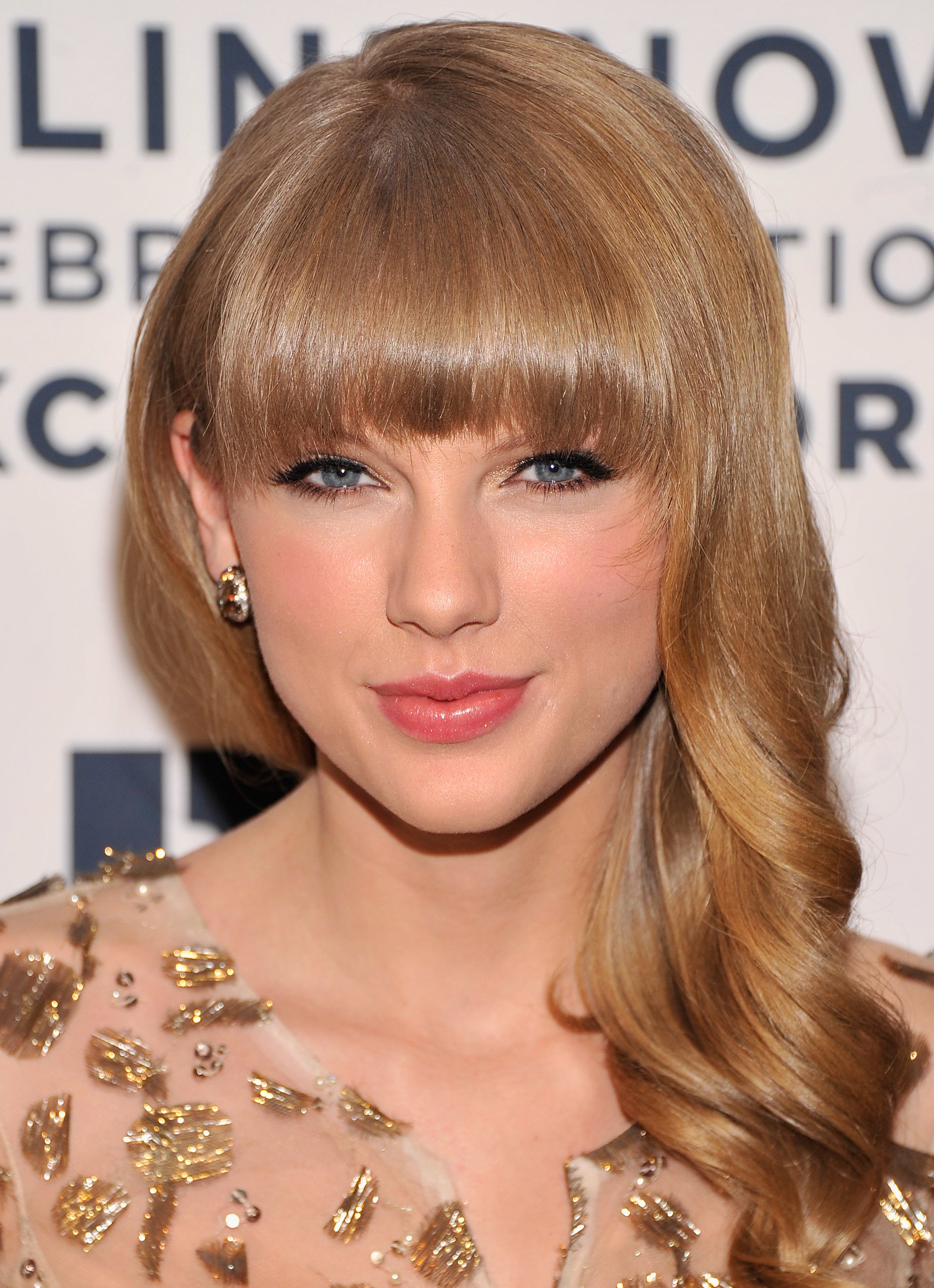 Close-up of Taylor at a media event