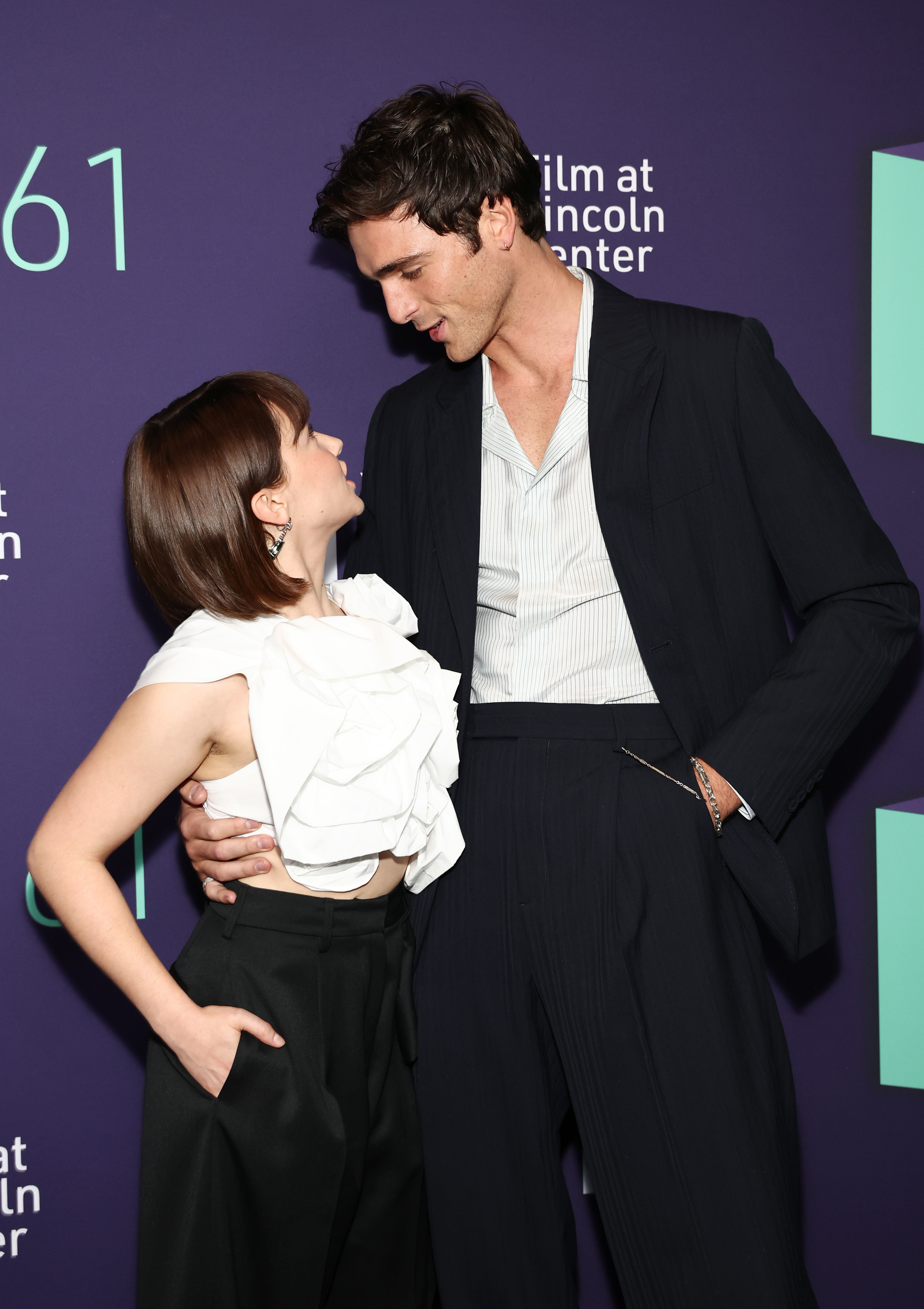 Jacob and Cailee dressed in white and black on the red carpet