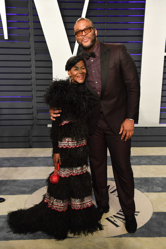 Tyler Perry with a woman