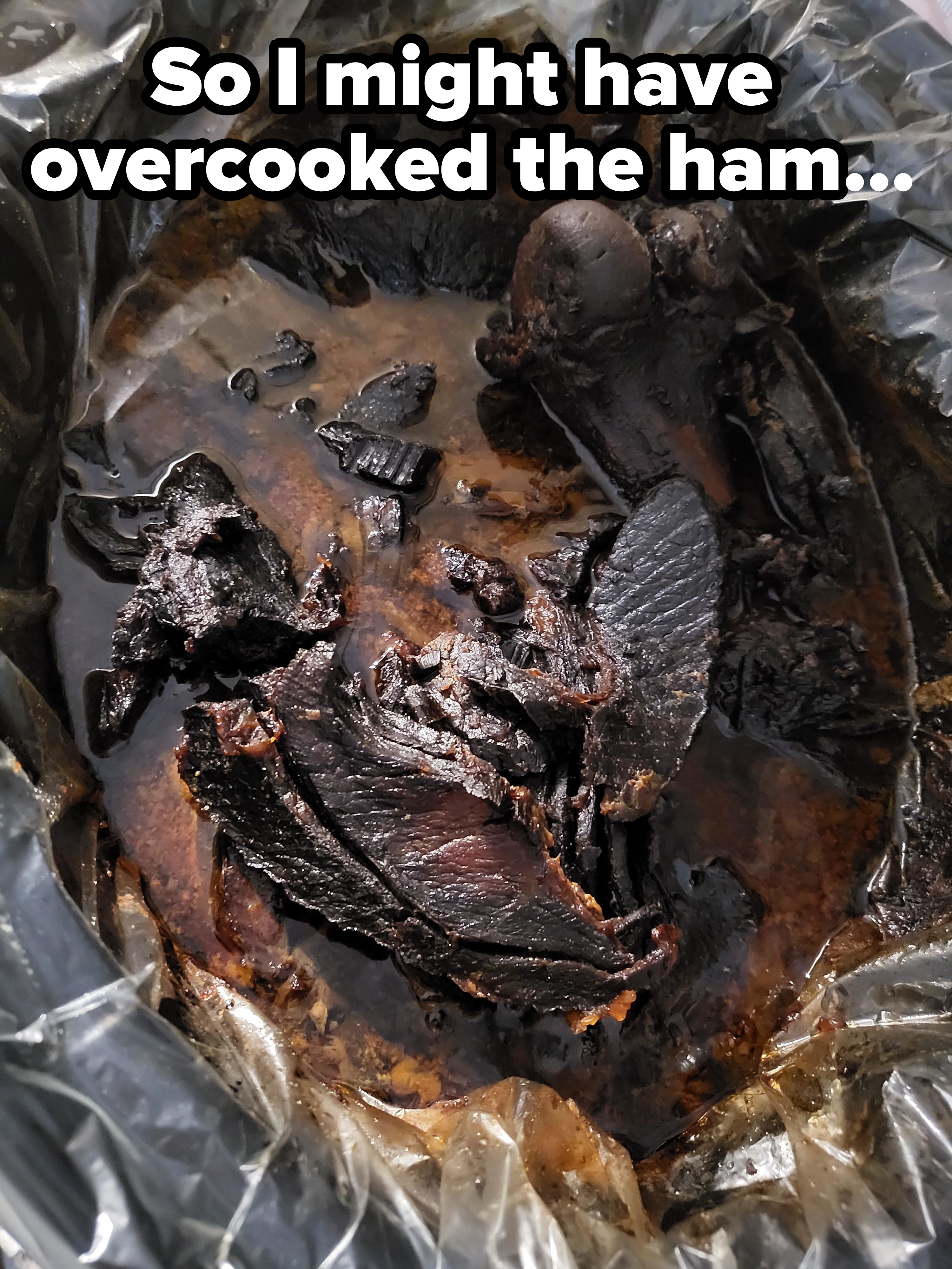 A gross, charred ham in pieces