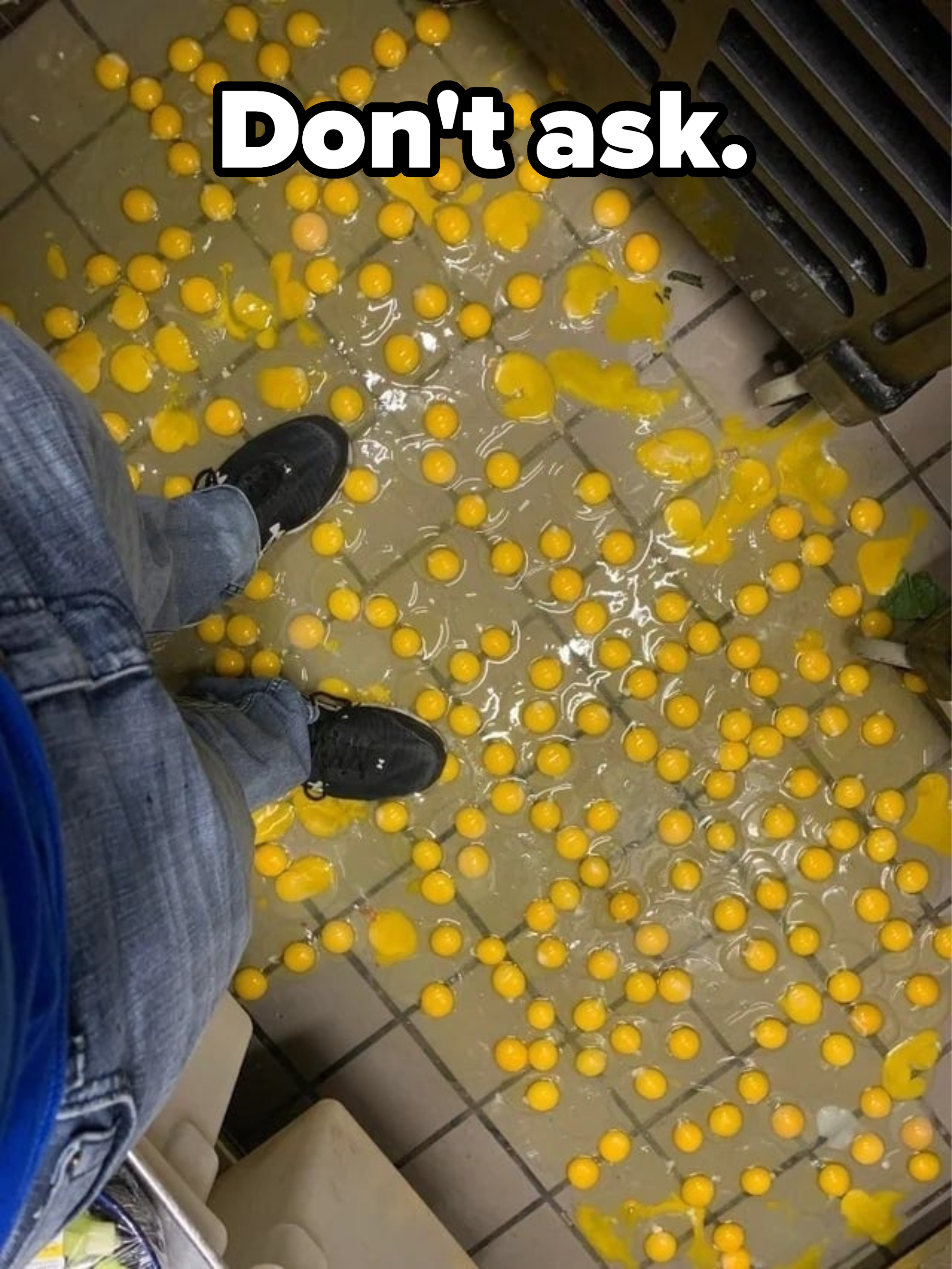 &quot;Don&#x27;t ask&quot; caption, with scores of egg yolks scattered on a kitchen floor