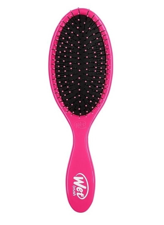 A pink detangling brush