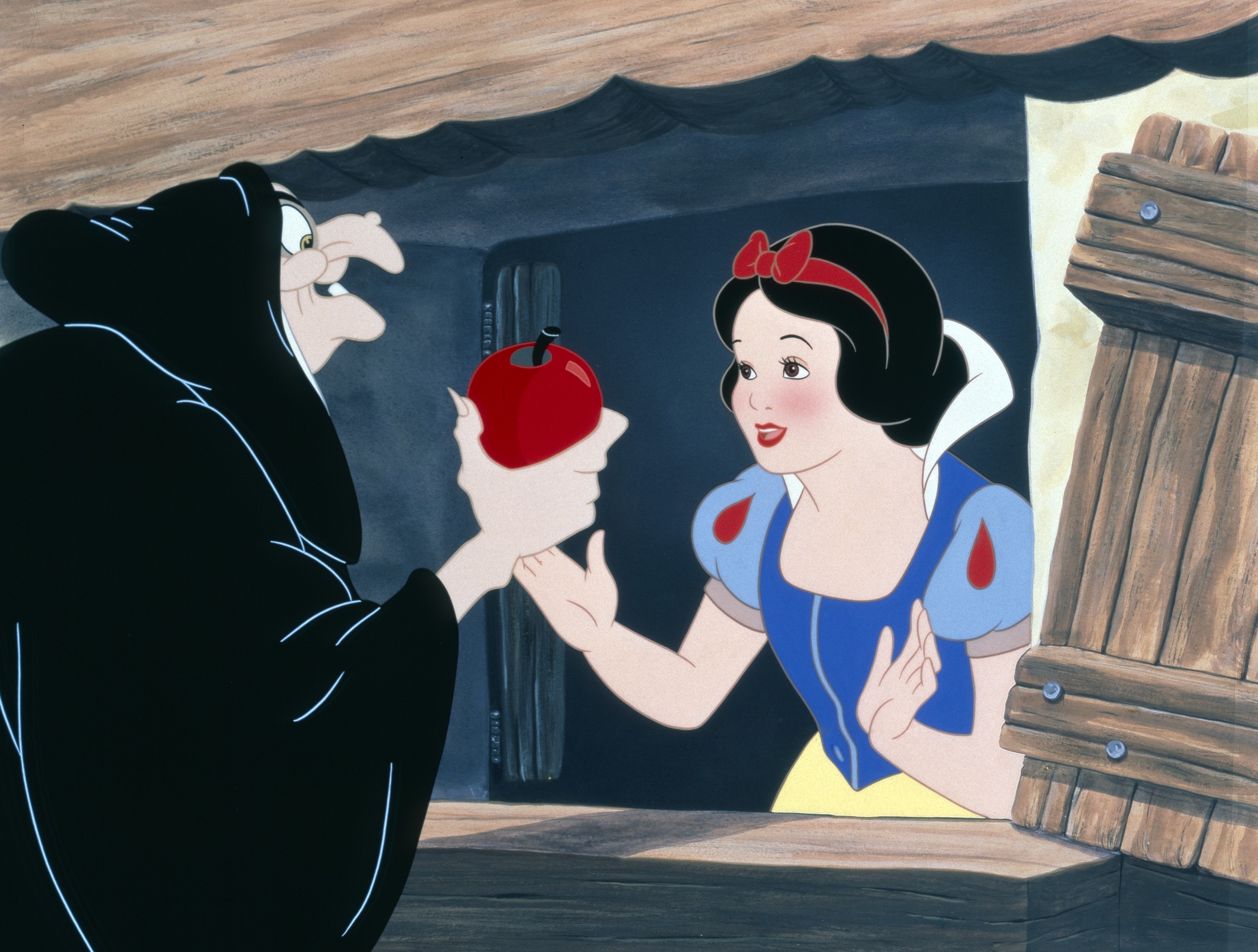 the animation version as she&#x27;s about to take the apple from the witch