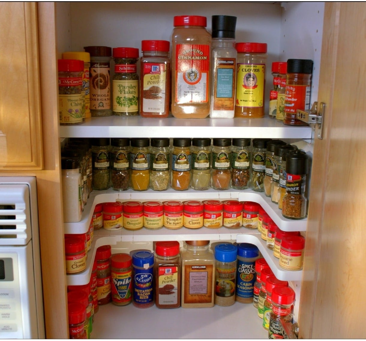 perimeter spice shelves in a cabinet