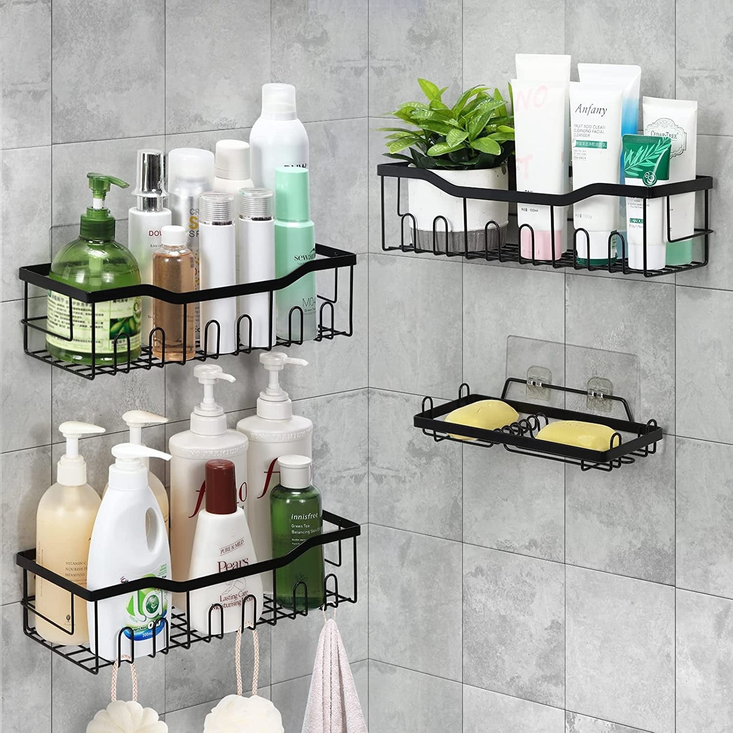 a set of four shower shelves with items on them.
