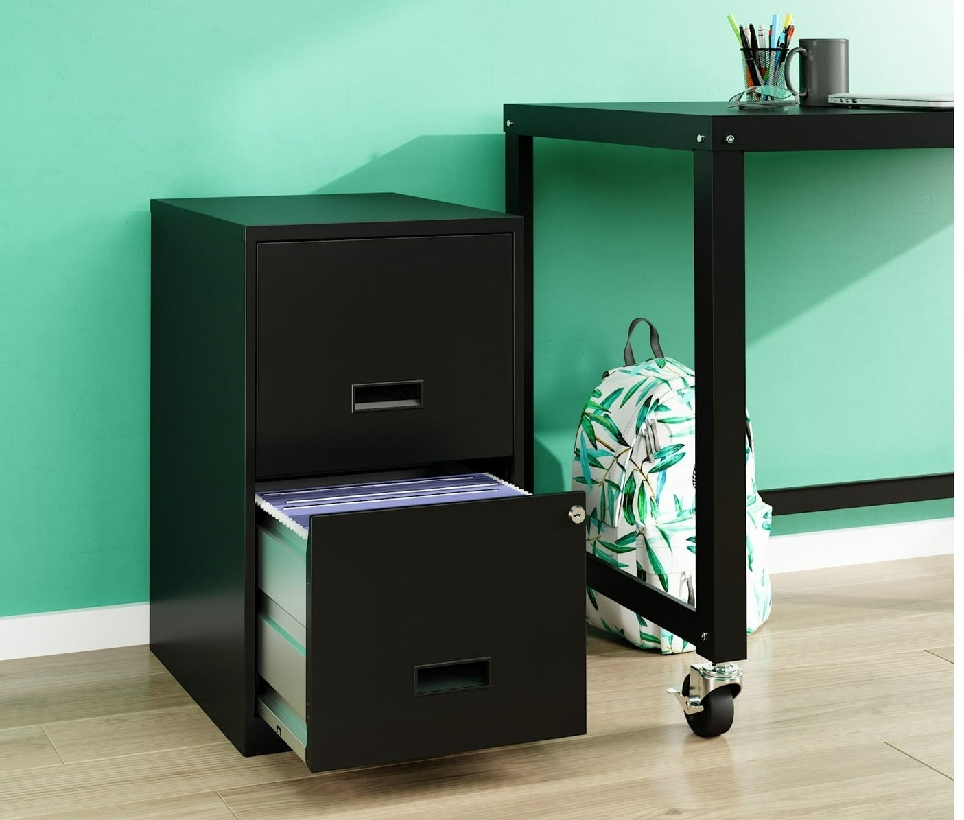 a black two drawer filing cabinet  in an office