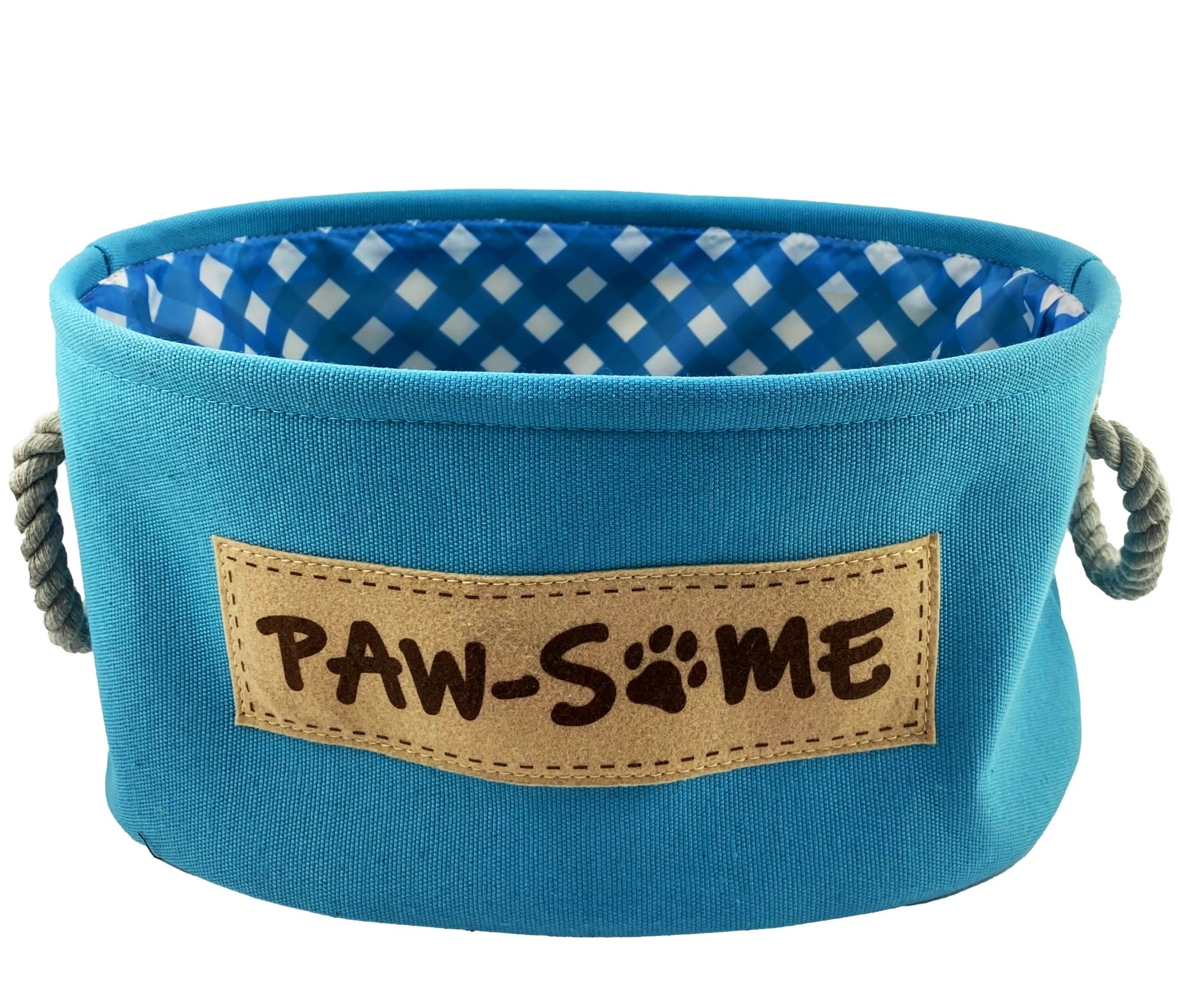a canvas fabric pet caddy with &quot;paw-some&quot; written on it